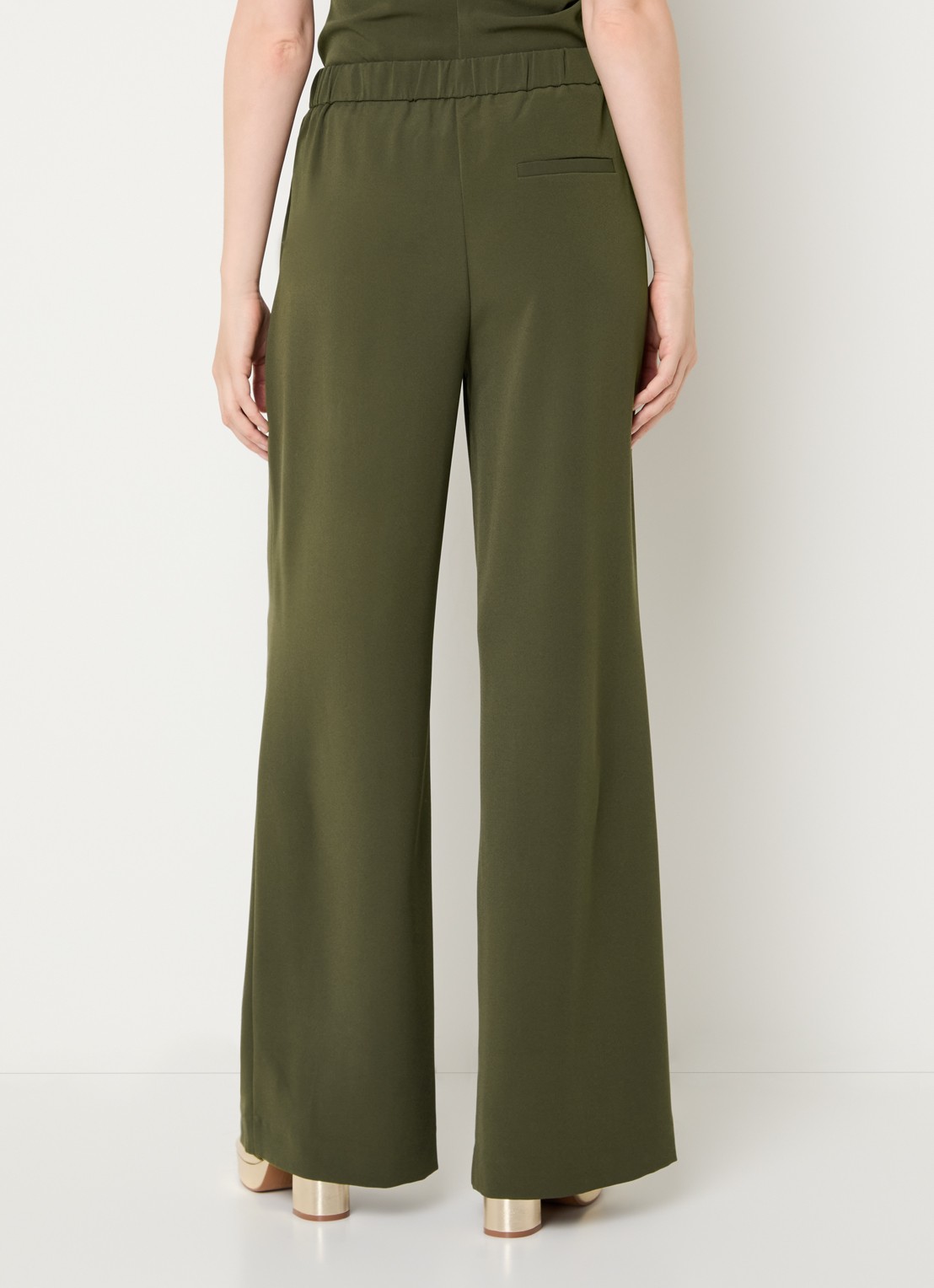 NIKKIE Amine high waist loose fit pantalon met steekzakken - achterkant groen
