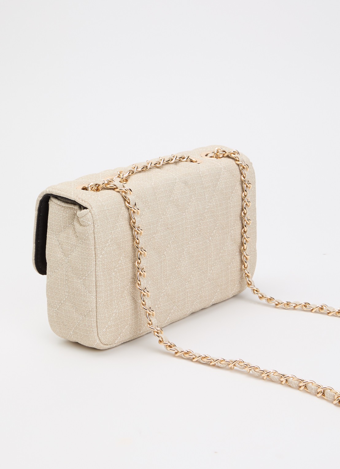 NIKKIE Ann crossbodytas met quilt patroon - achterkant beige