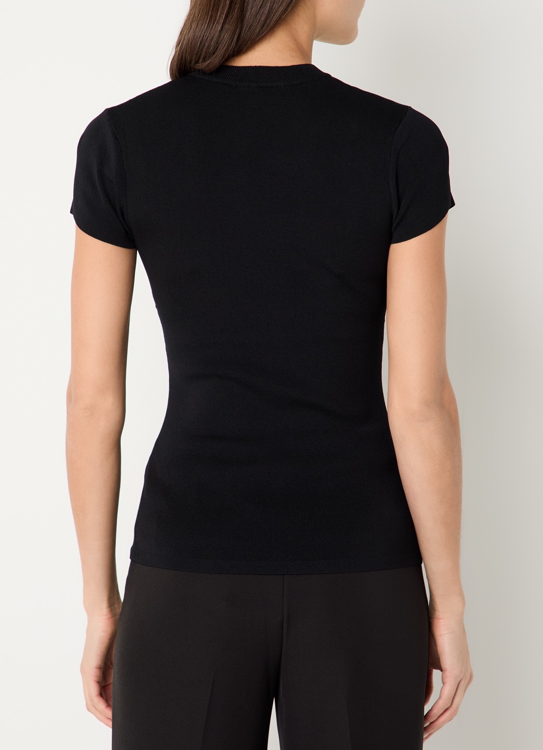 NIKKIE Jofli top met ribstructuur en stretch - achterkant zwart