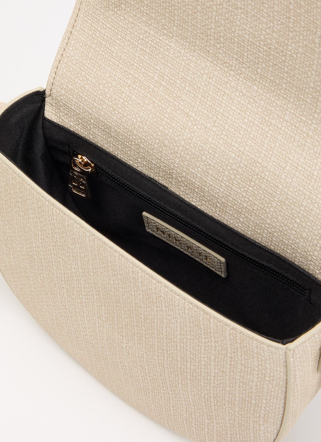 NIKKIE Pelano Lace-Up schoudertas met afneembare schouderriem - detail 3 creme