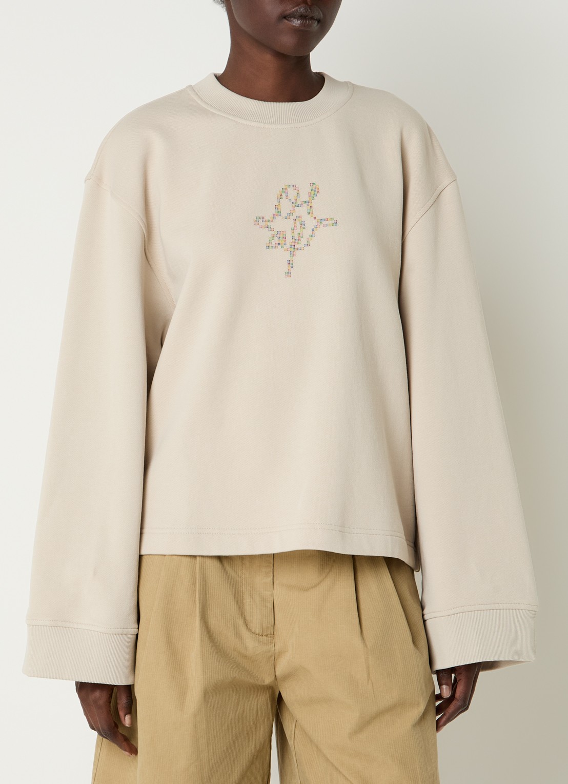 OLAF Sweater met print en trompetmouw - detail 2 beige