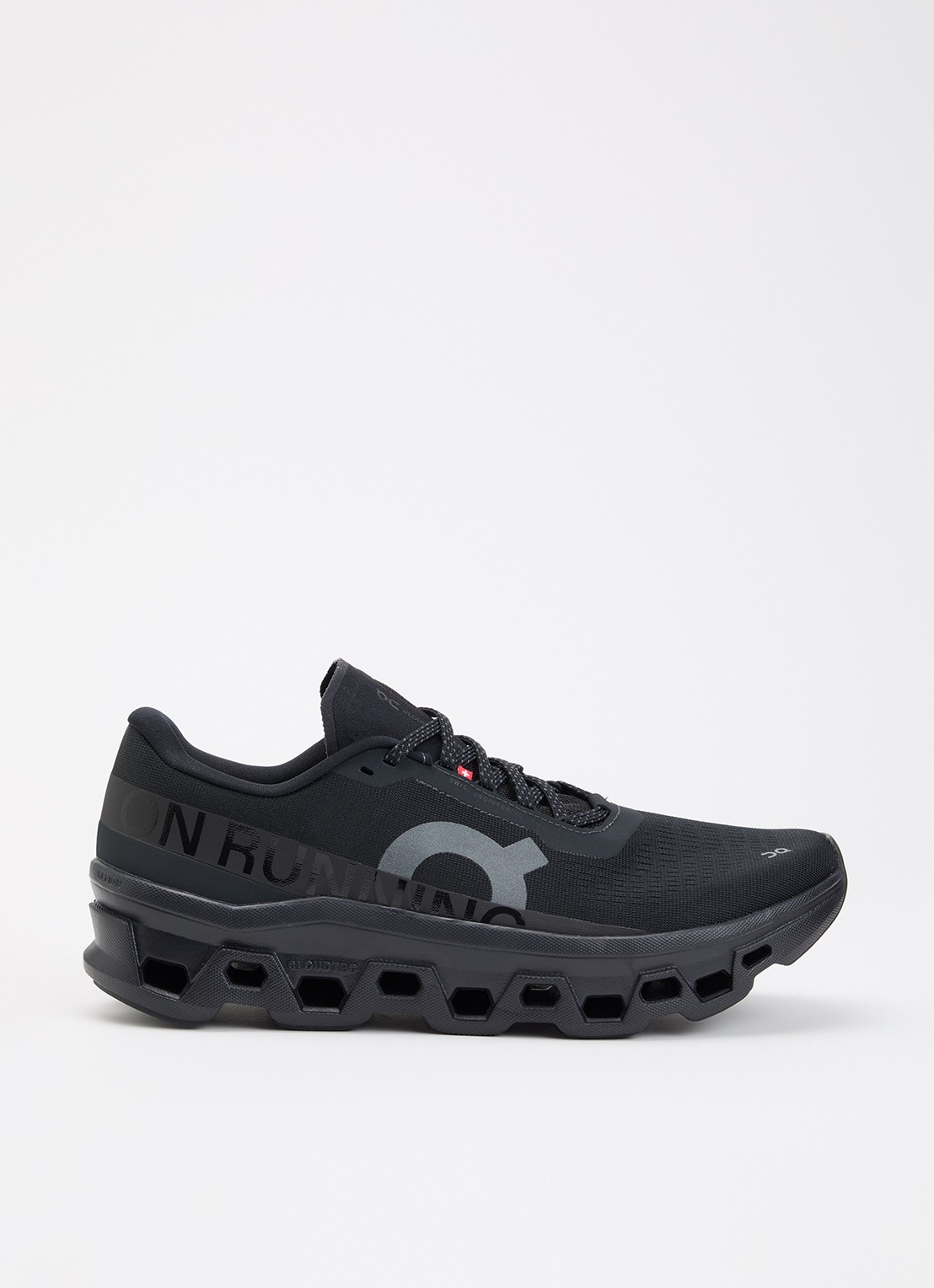 On Cloudmonster sneaker van mesh met logo - voorkant zwart