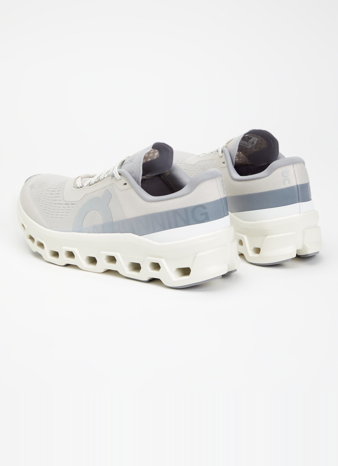 On Cloudmonster sneaker van mesh met logo - achterkant lichtgrijs