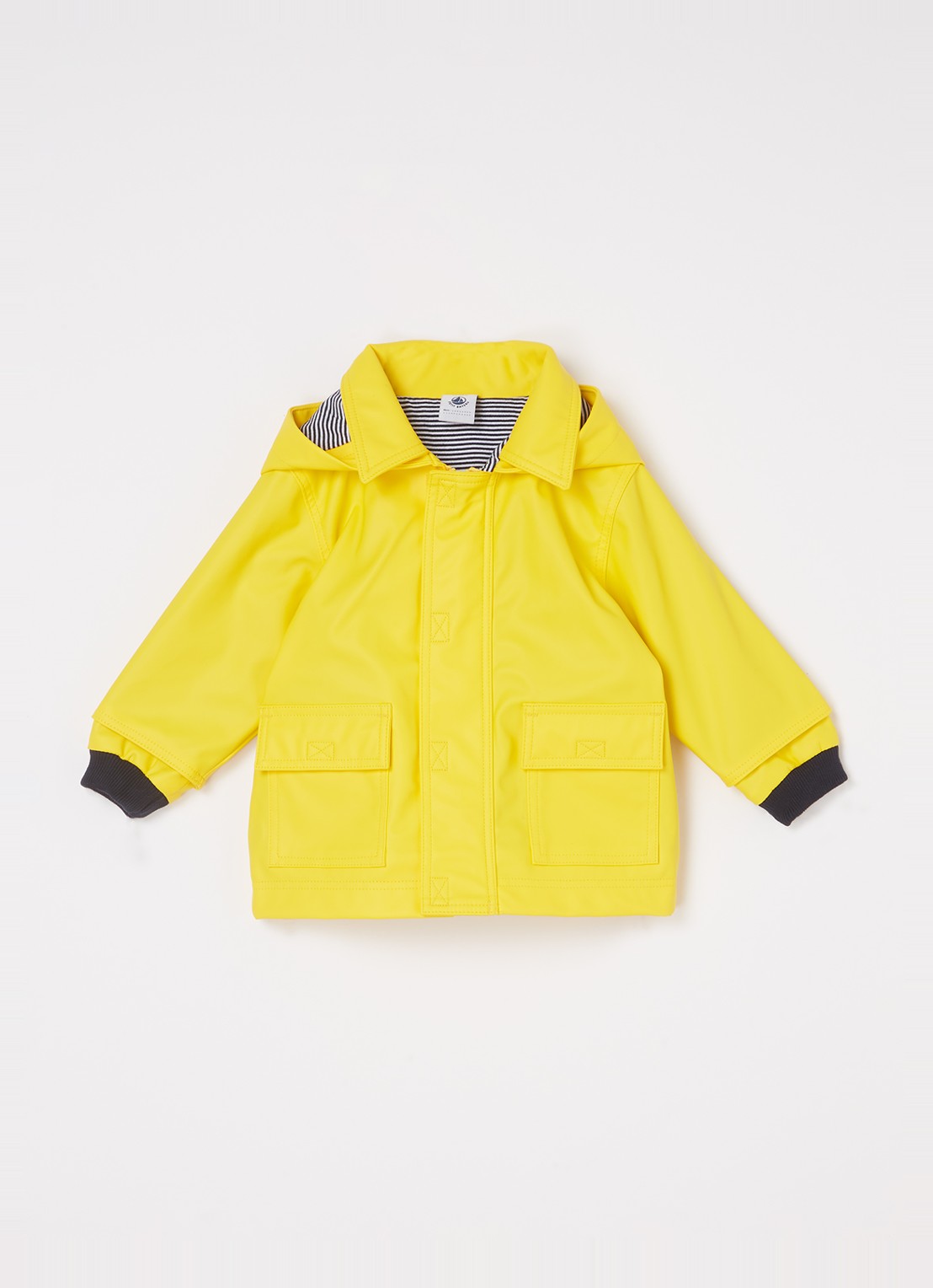 Petit Bateau Regenjas met klepzakken     - voorkant lichtgeel