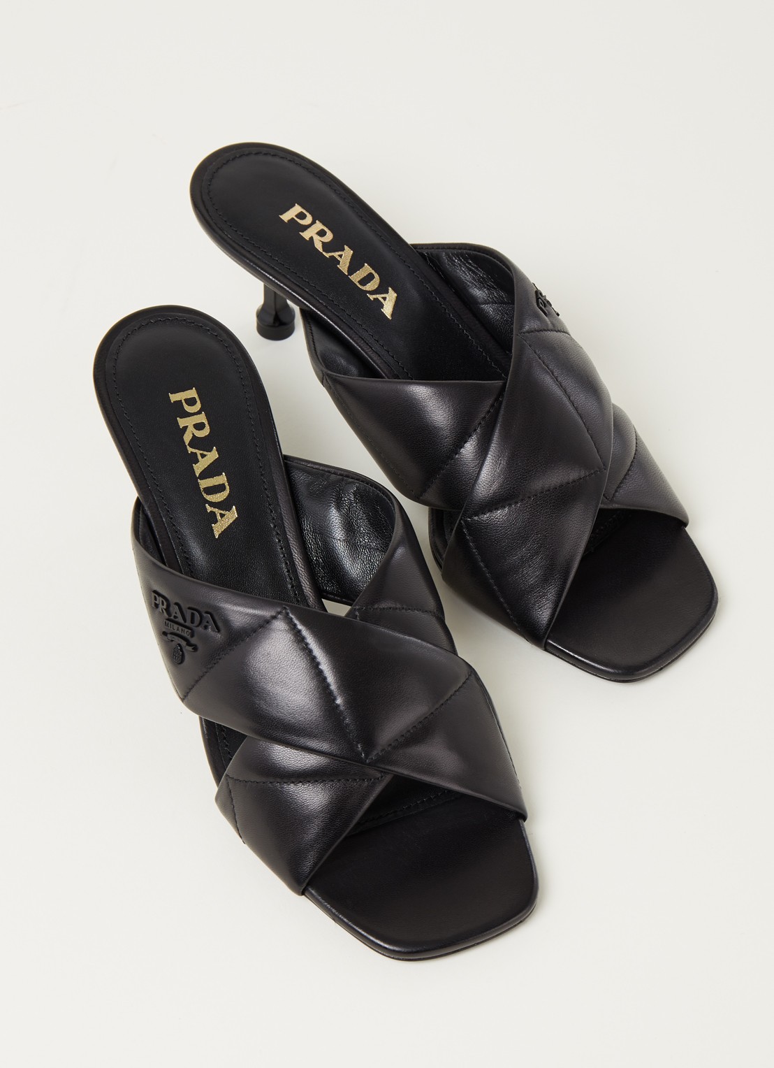 Prada Gewatteerd muiltje van leer - detail zwart
