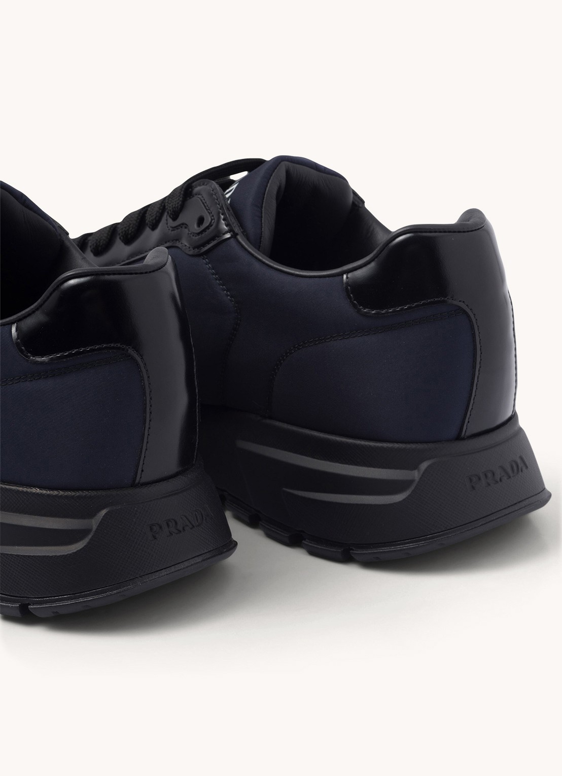 Prada Prax 01 Re-Nylon sneakers met leren details en logo - detail 7 donkerblauw