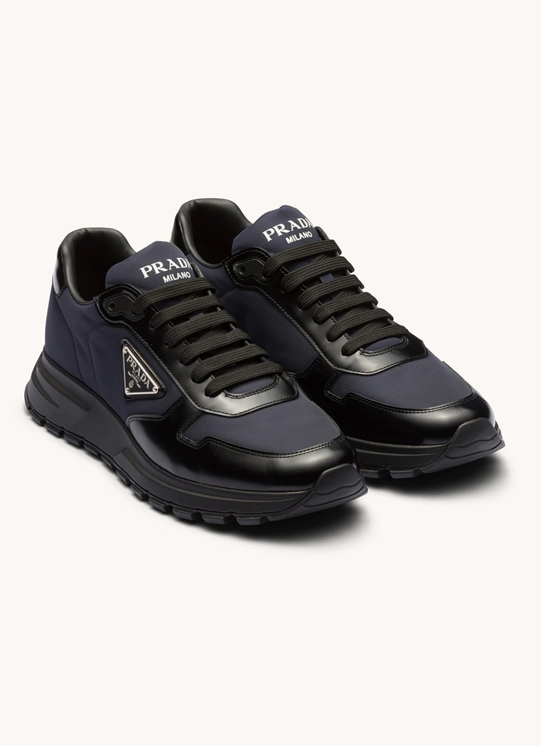 Prada Prax 01 Re-Nylon sneakers met leren details en logo - voorkant 2 donkerblauw