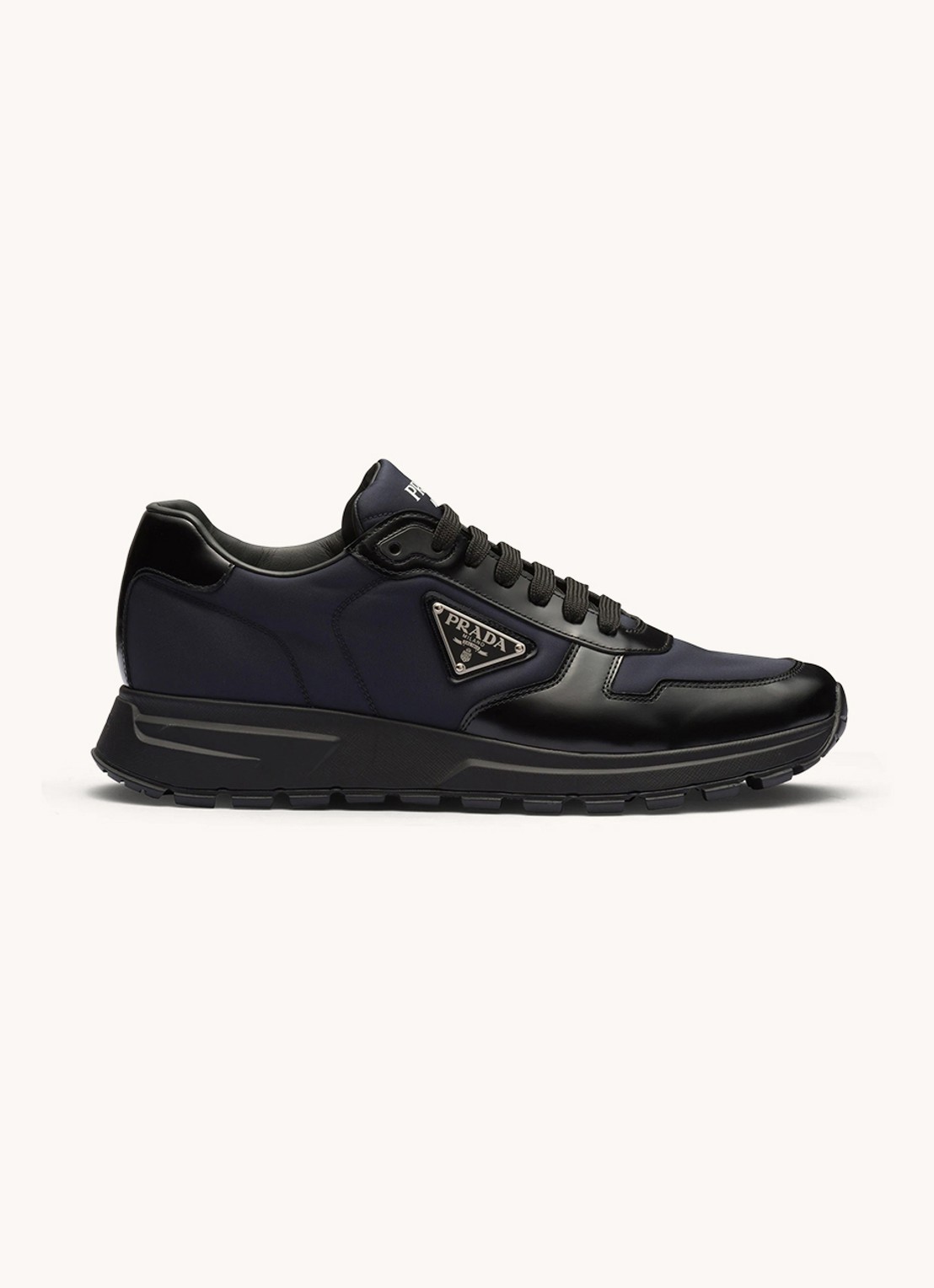 Prada Prax 01 Re-Nylon sneakers met leren details en logo - voorkant 3 donkerblauw