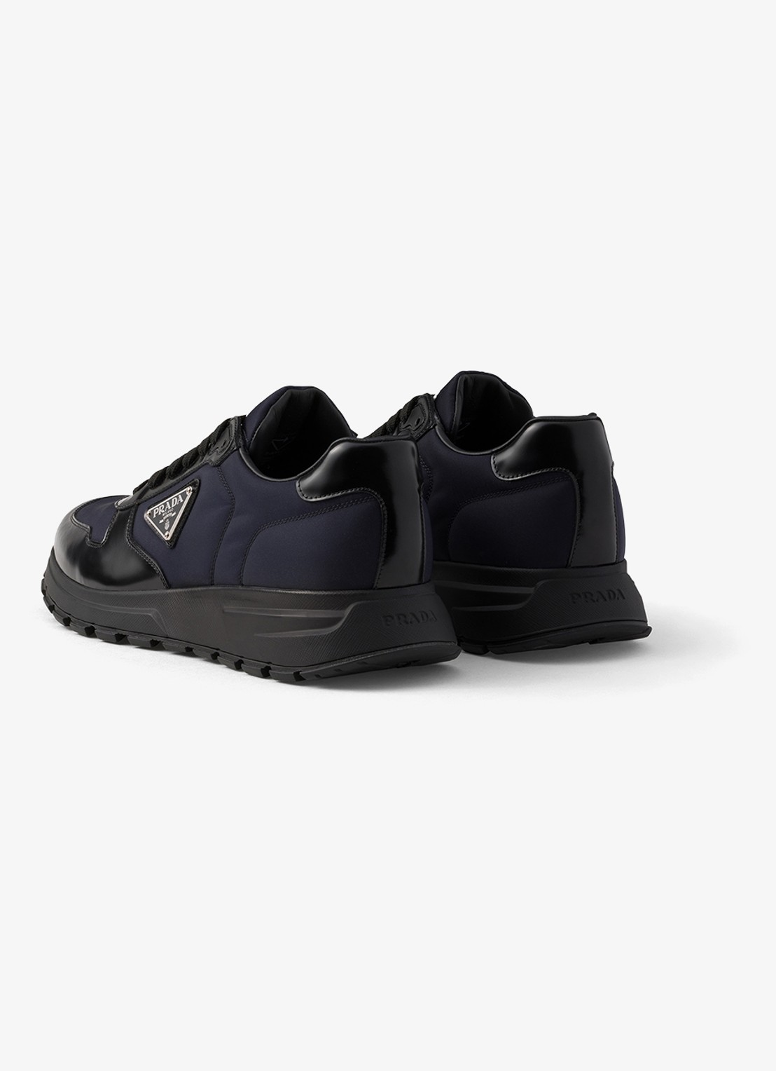 Prada Prax Re-Nylon sneaker met leren details - achterkant 3 donkerblauw