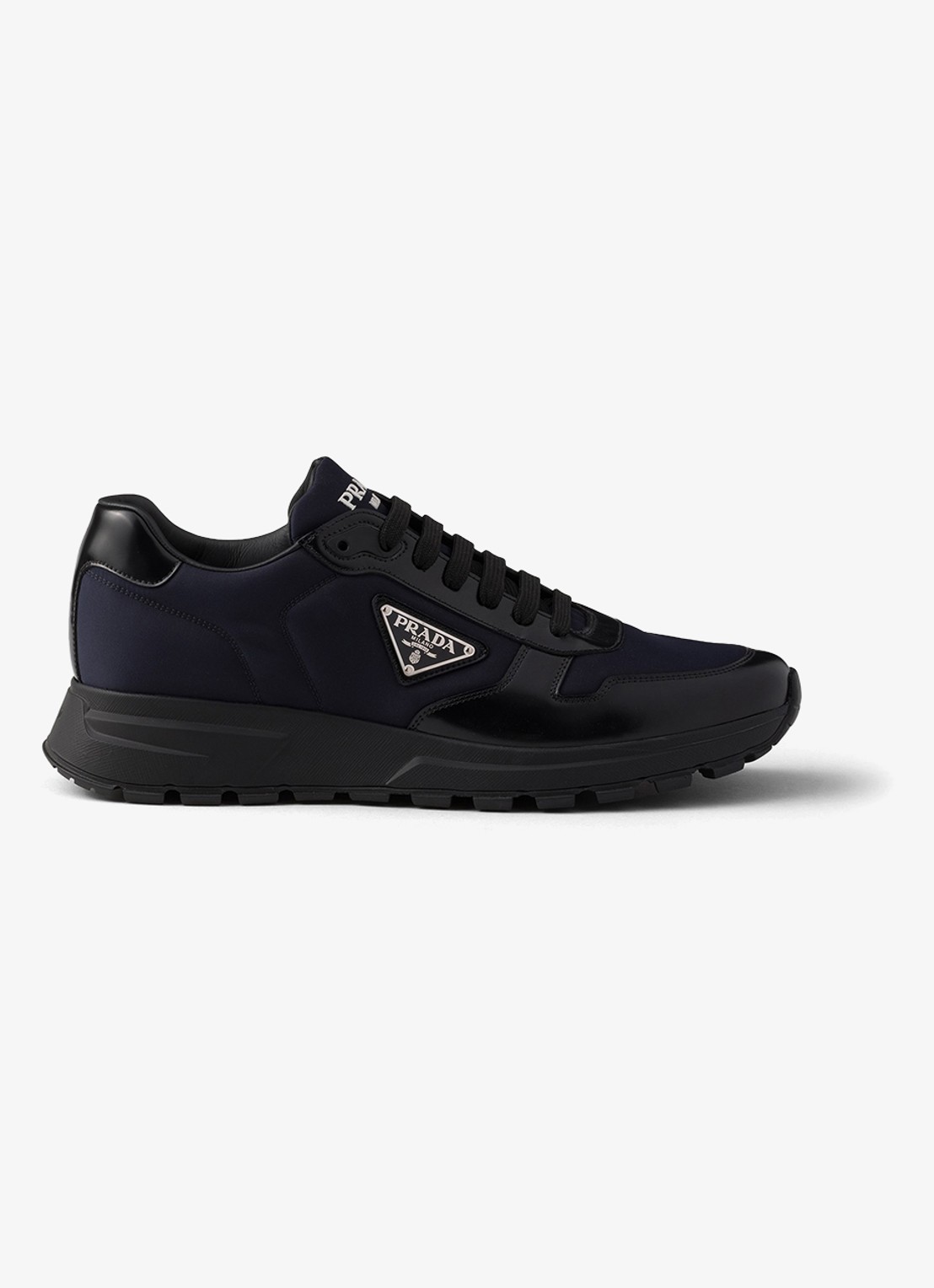 Prada Prax Re-Nylon sneaker met leren details - voorkant donkerblauw