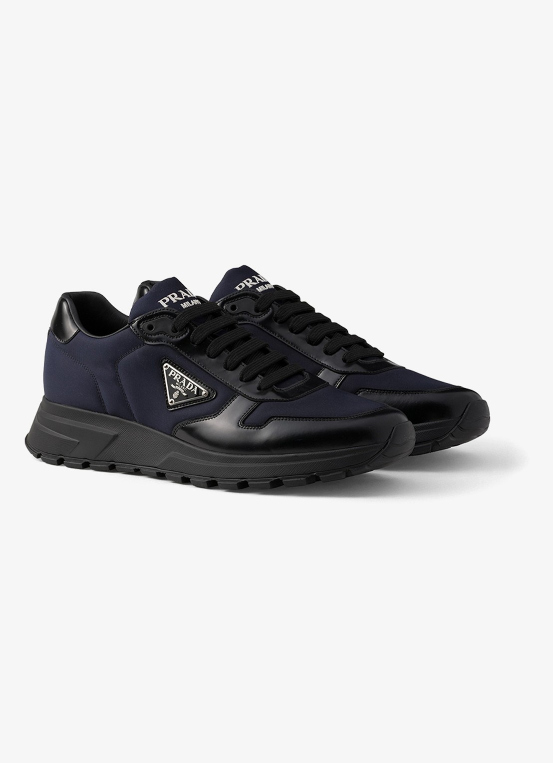 Prada Prax Re-Nylon sneaker met leren details - voorkant 2 donkerblauw