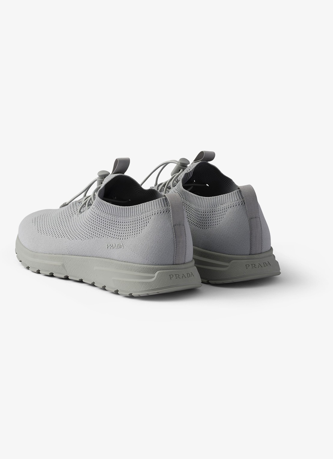 Prada Prax sneaker met gebreid bovenwerk - achterkant 3 grijs