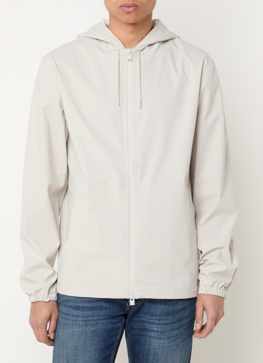 Rains Suva regenjas met capuchon en ritszakken - detail beige