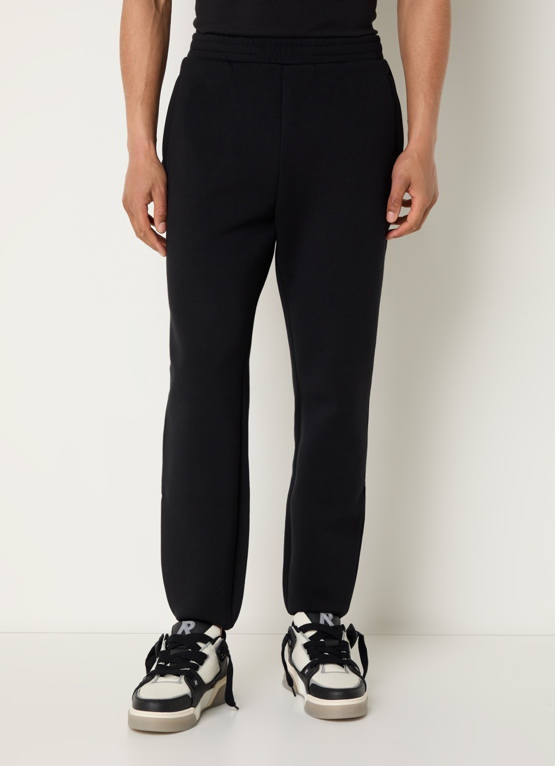 Represent 247 Numbers tapered fit joggingsbroek met logo en steekzakken - detail zwart