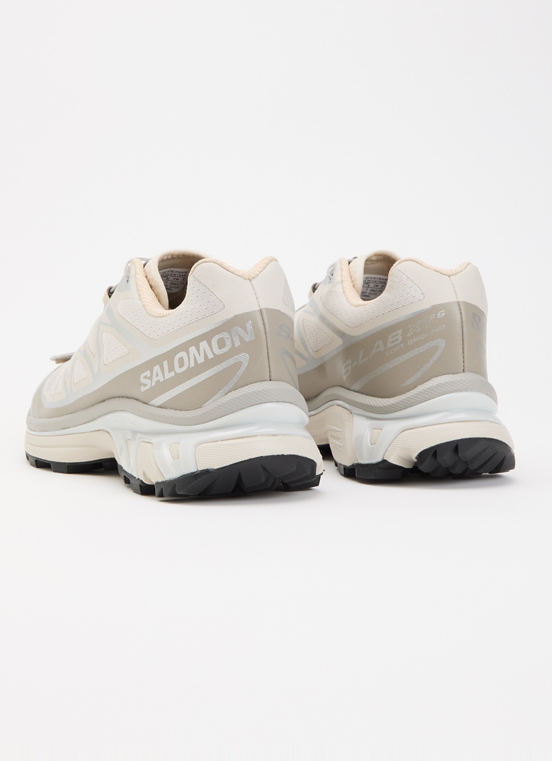 Salomon XT-6 sneaker met mesh details en metallic finish - achterkant beige