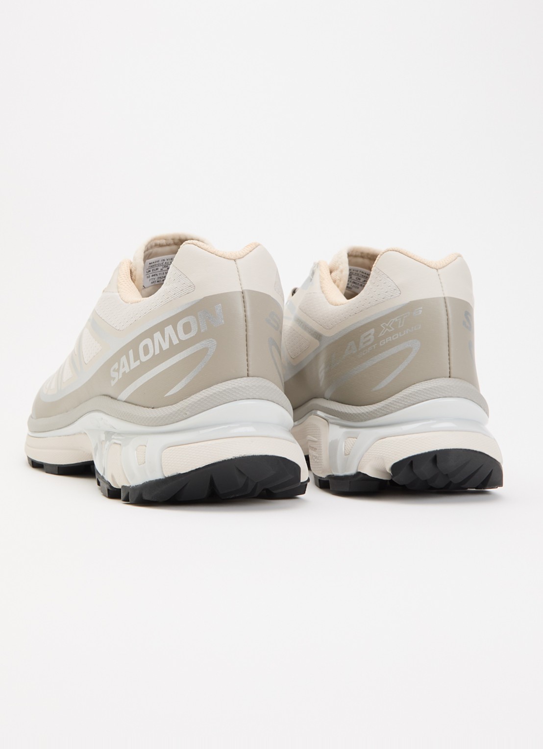 Salomon XT-6 sneaker met mesh details en metallic finish - achterkant beige