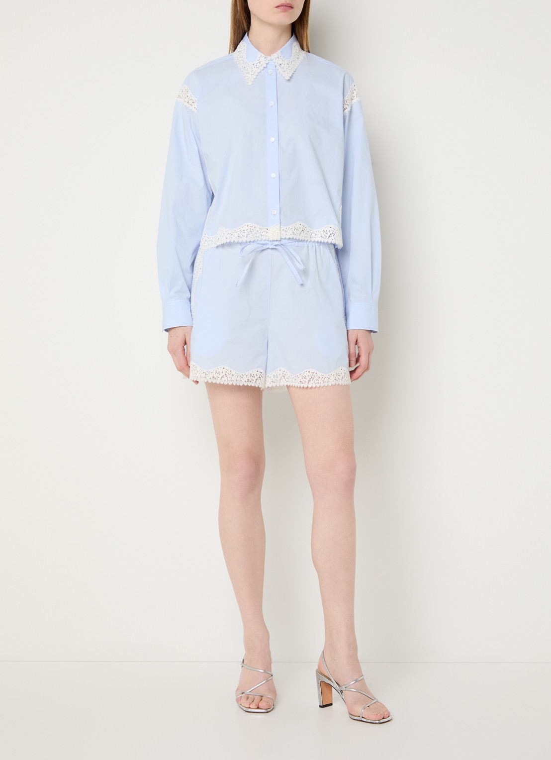 Sandro Blouse met details van kant - voorkant 2 lichtblauw
