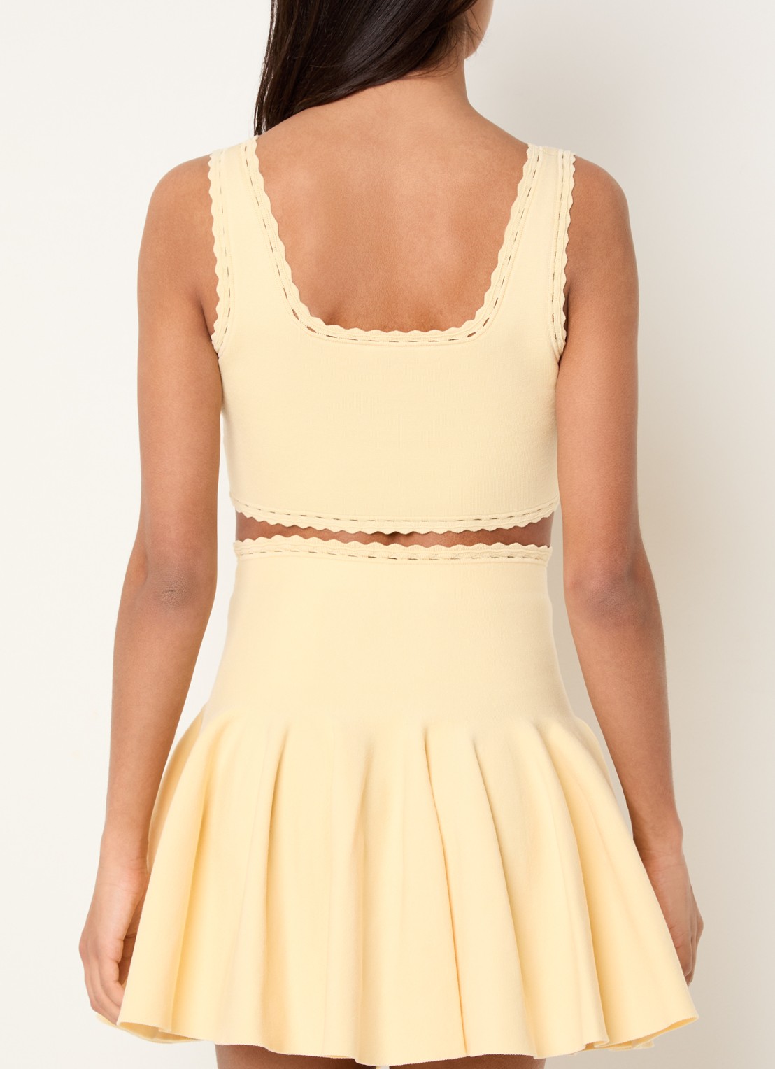 Sandro Fijngebreide crop top met broderie detail - achterkant 2 geel