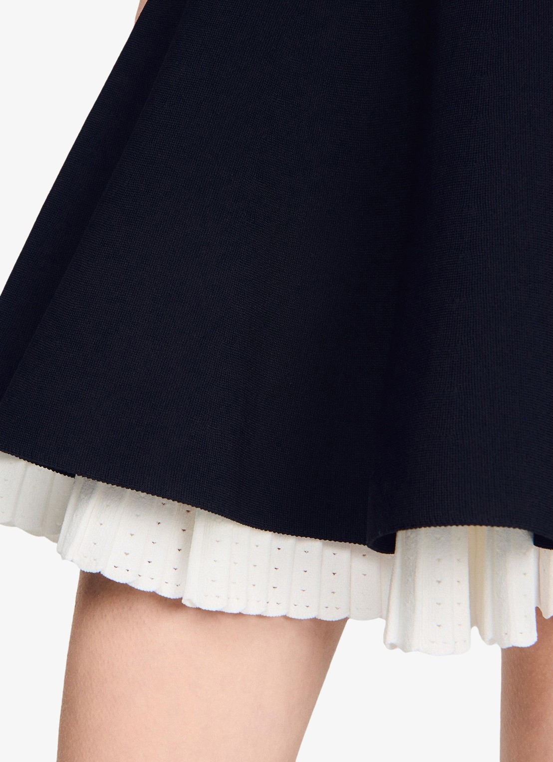 Sandro Gebreide mini rok met plooien - detail 5 zwart