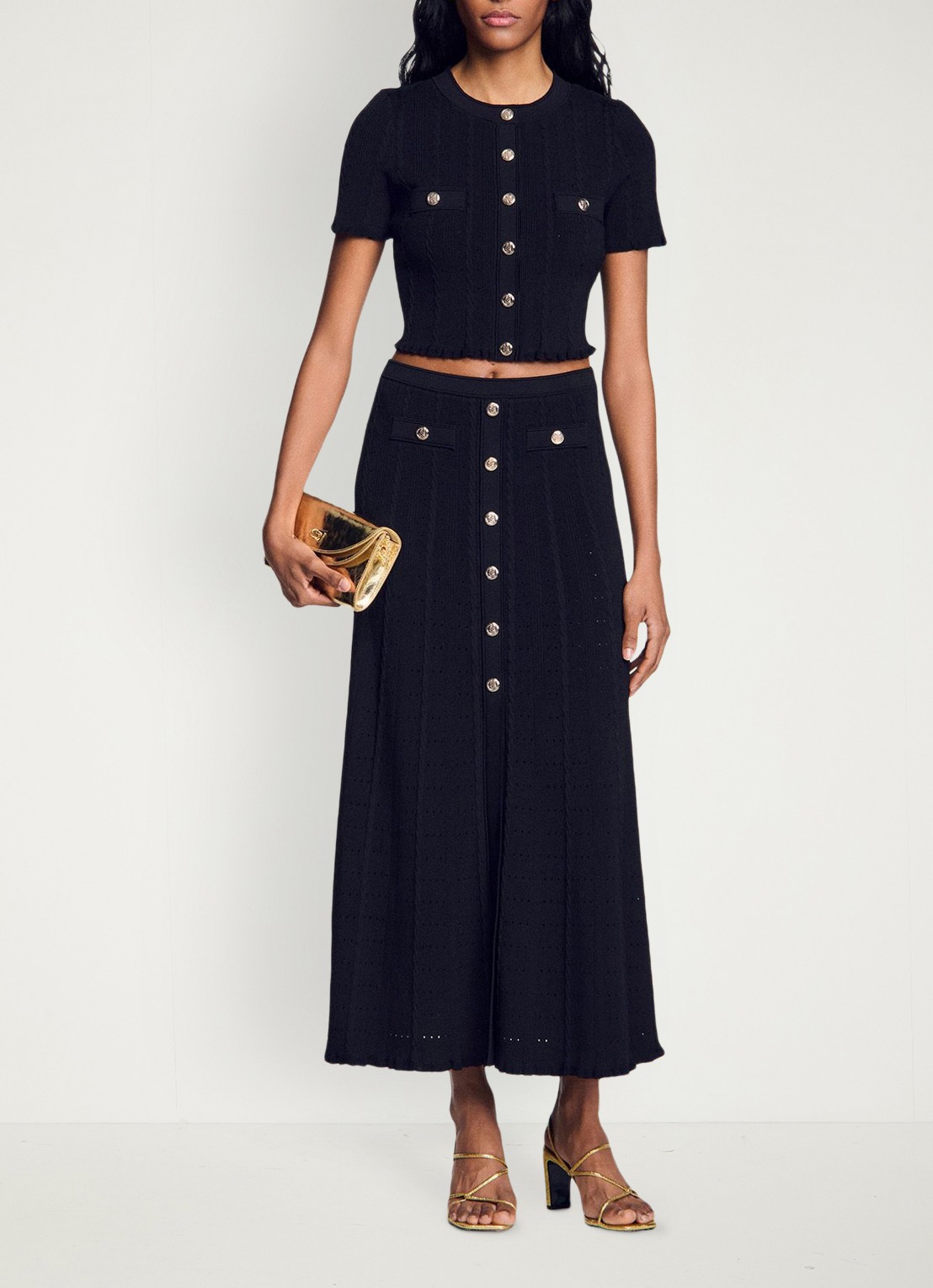 Sandro Grofgebreide blouse met borstzak - voorkant zwart