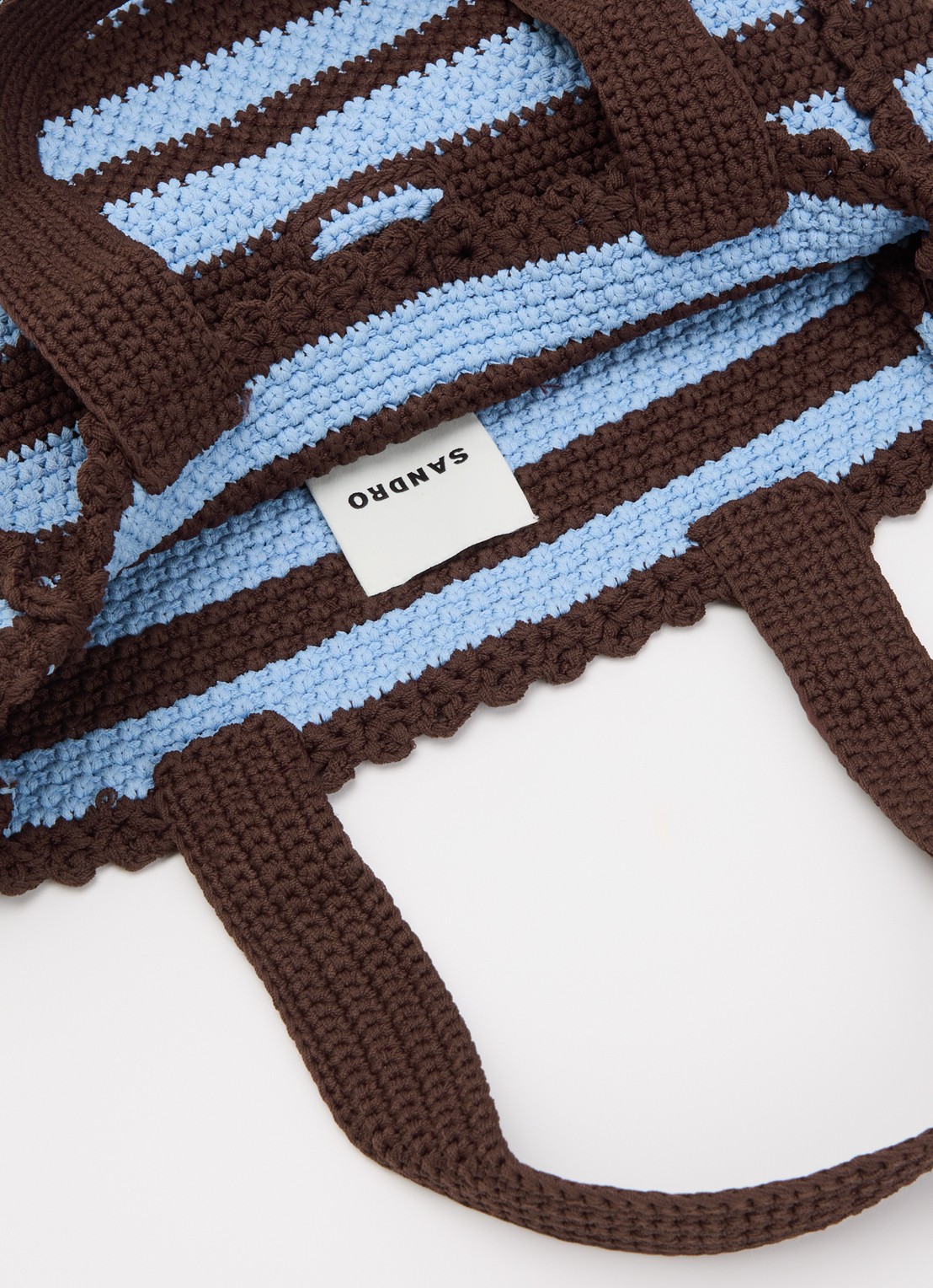 Sandro Handtas van crochet met streepprint en logo - detail 3 lichtblauw