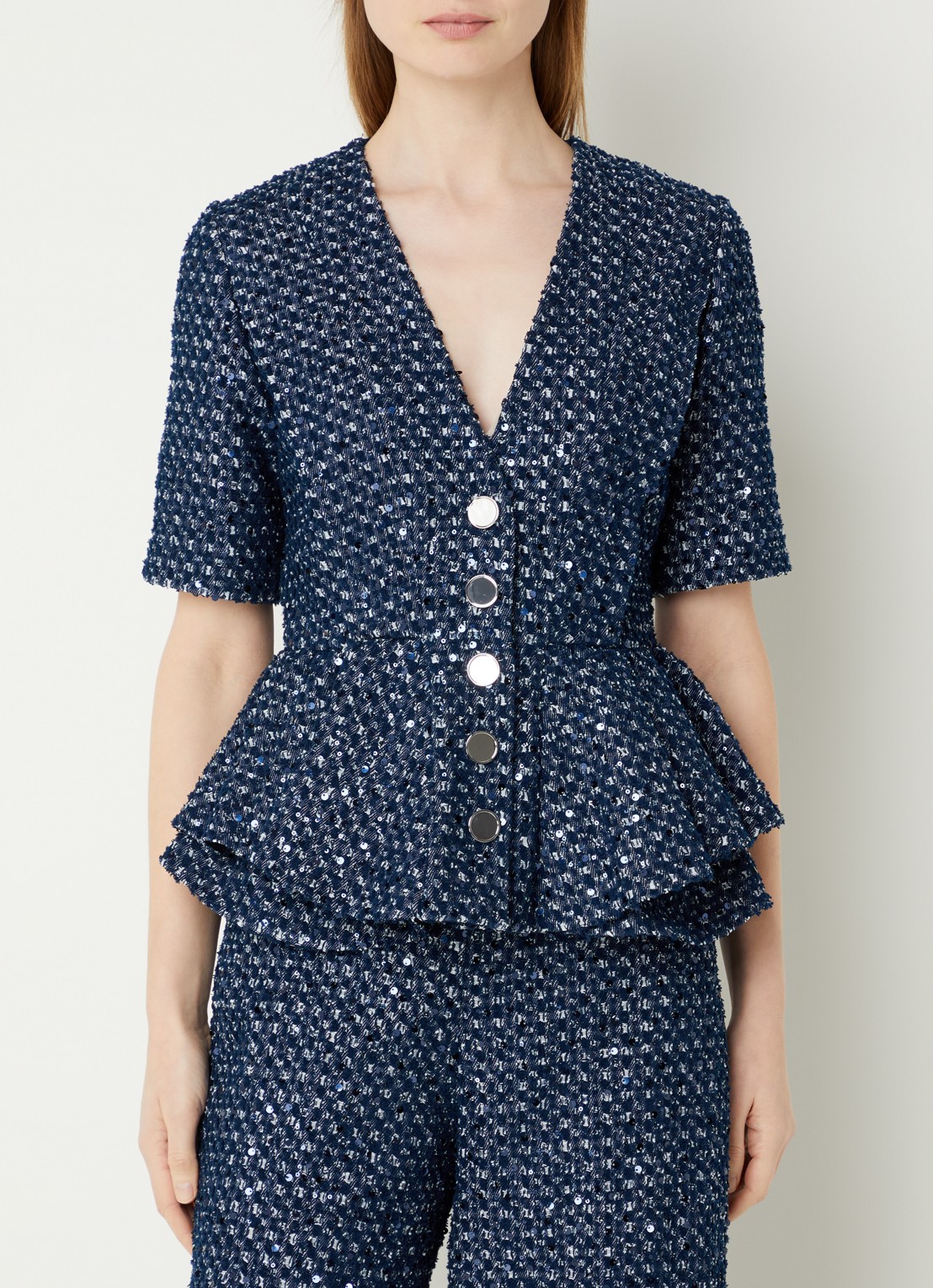 Sandro Top met pailletten en peplum - detail indigo