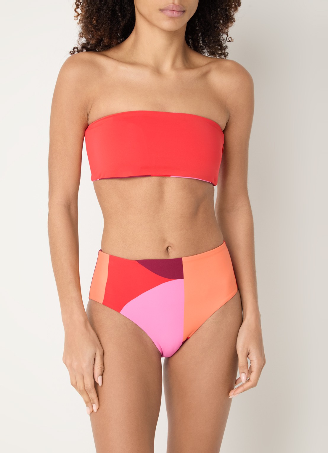 Seafolly Sorrento reversible bandeau bikinitop met print - voorkant 5 koraalroze