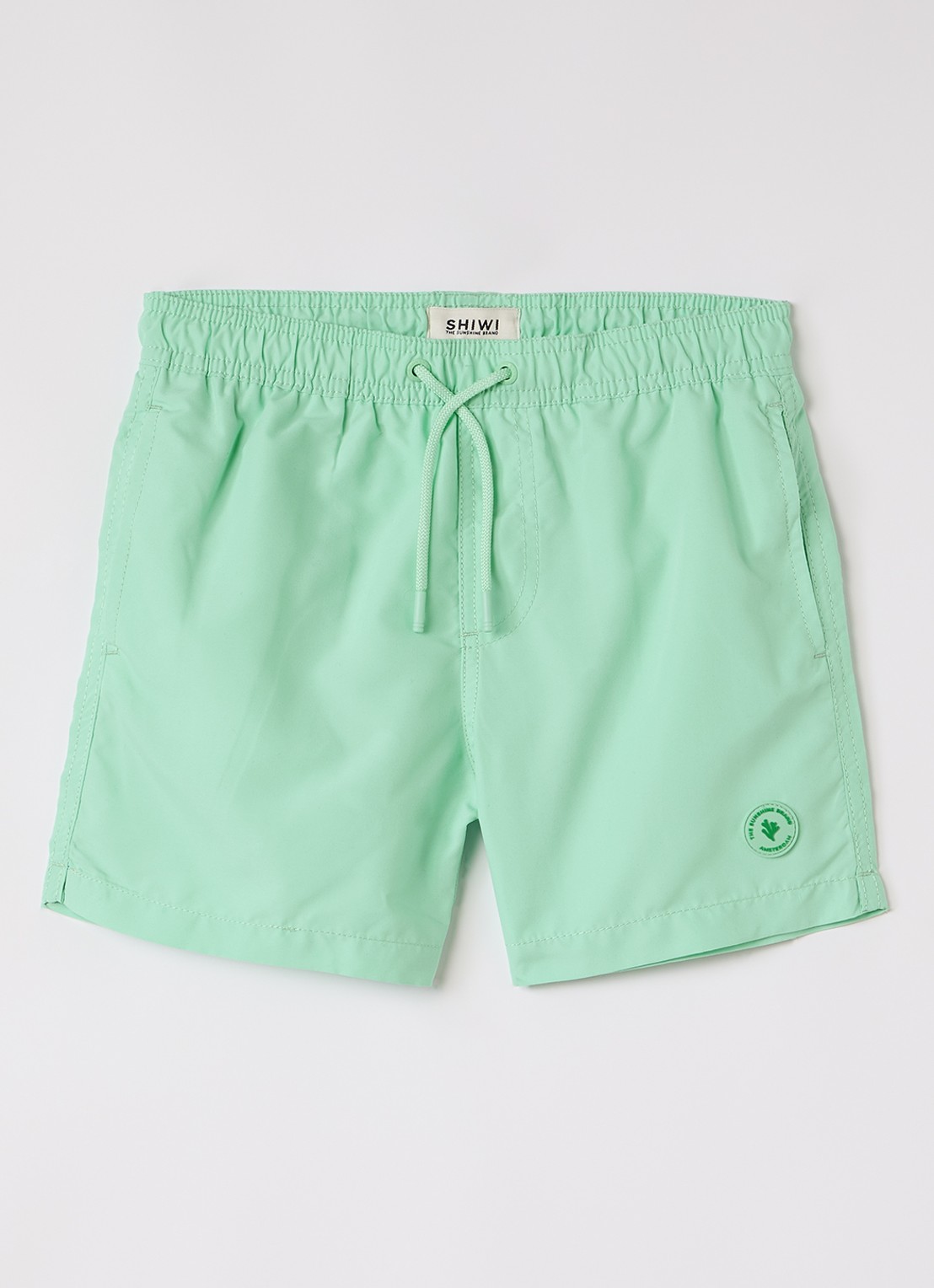 Shiwi Milo zwemshorts met steekzakken - voorkant groen