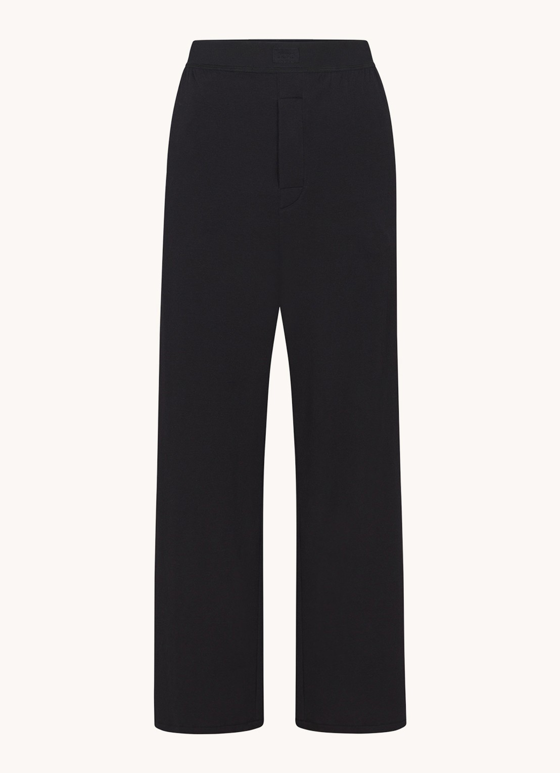 SKIMS Boyfriend mid waist loose fit loungebroek met steekzakken - voorkant 2 zwart