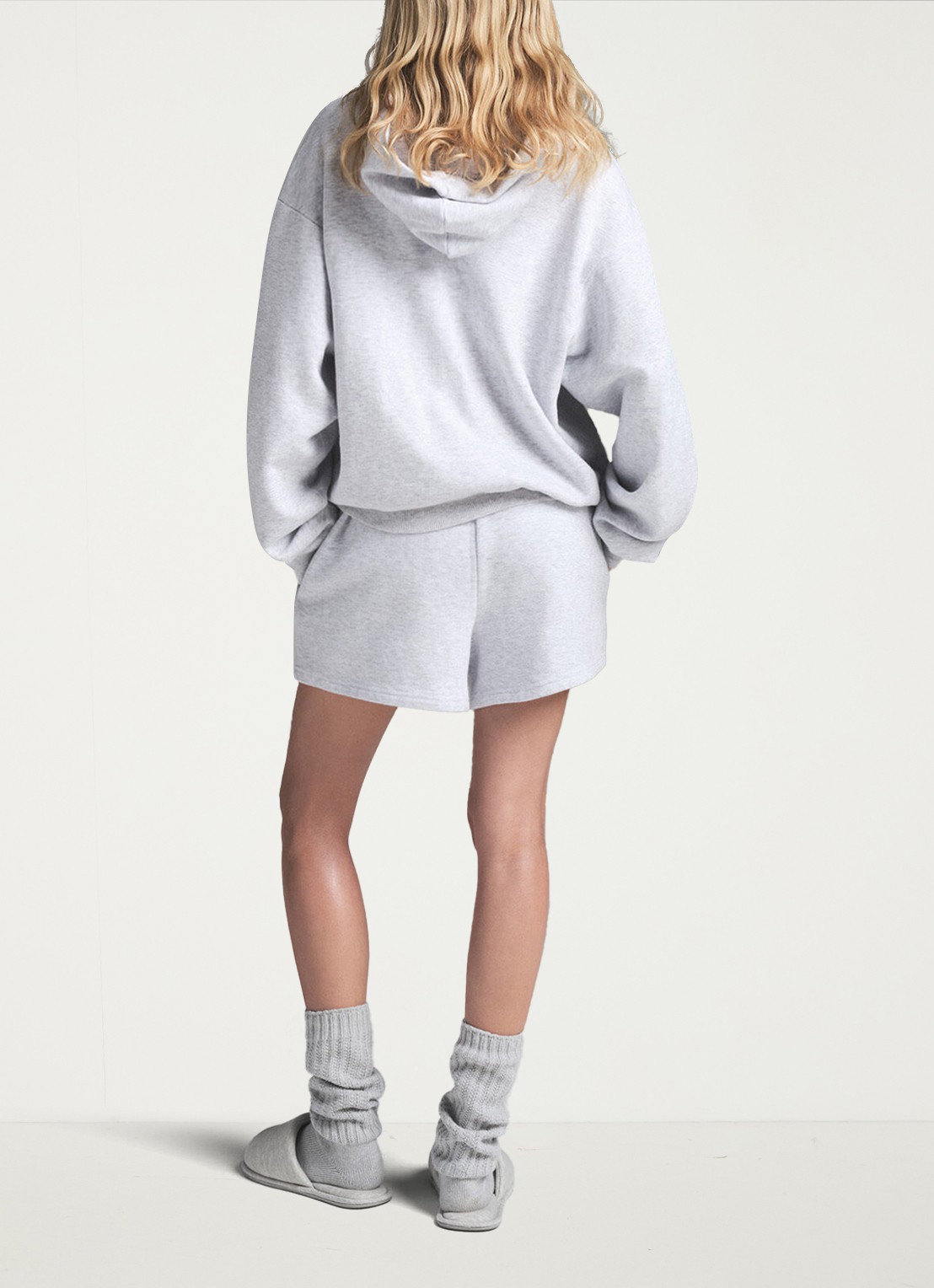 SKIMS Cotton Fleece hoodie met kangoeroezak - achterkant grijsmele