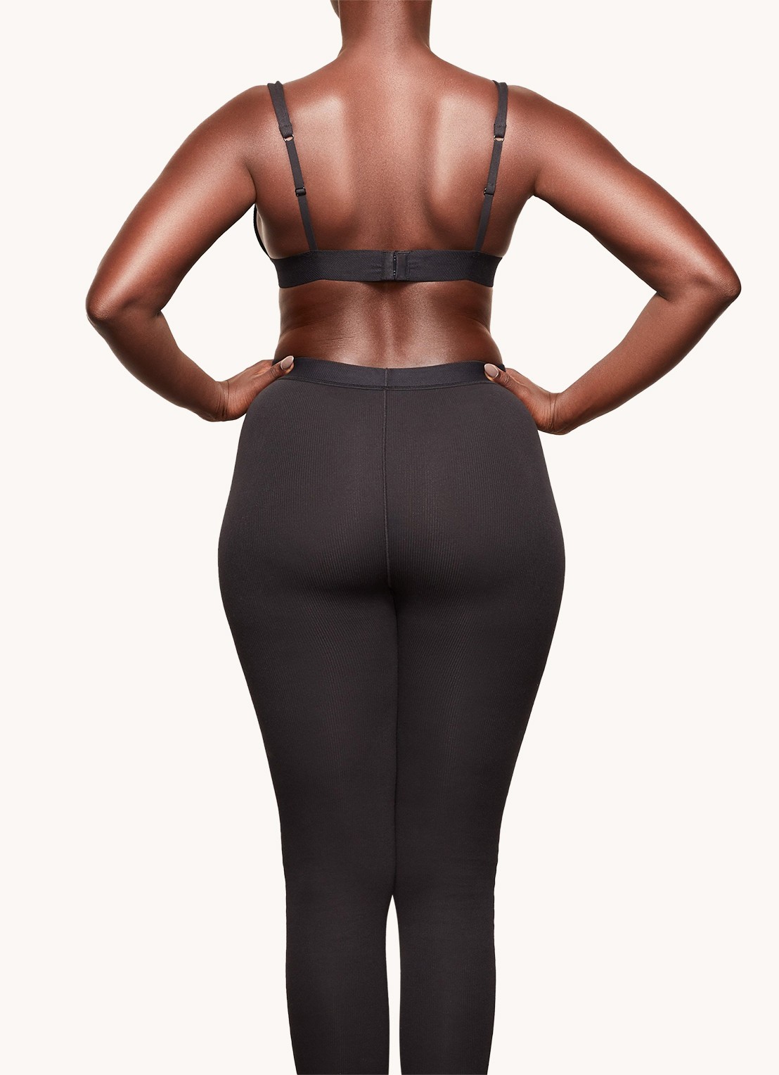 SKIMS Cotton Rib high waist loungebroek met ribstructuur - achterkant zwart