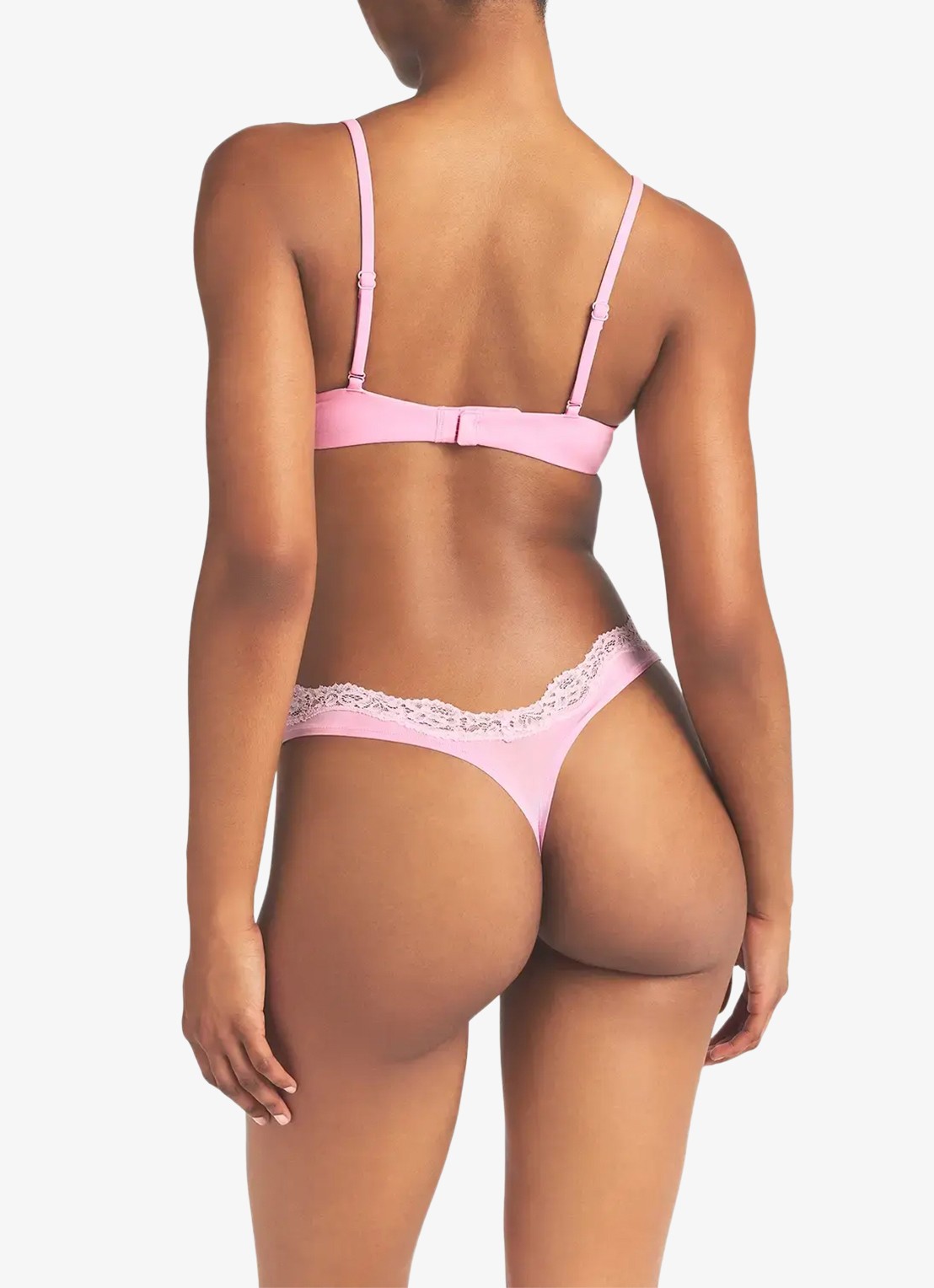 SKIMS Fits Everybody string met details van kant  - achterkant 2 roze