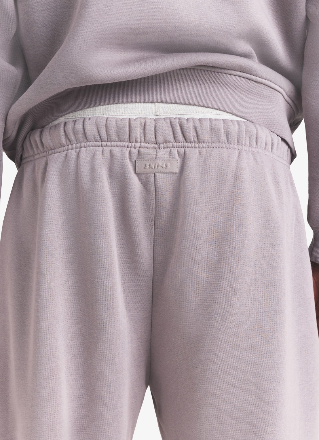 SKIMS Fleece Lounge joggingsbroek met steekzakken - detail 5 shadow