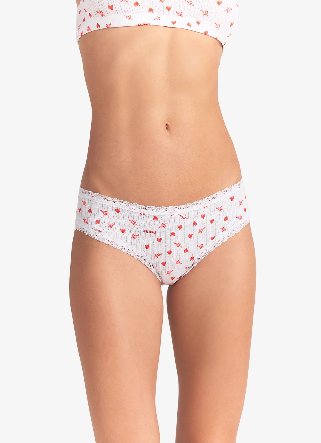 SKIMS Lightweight Cotton Pointelle slip met print en kant - detail 2 snow arrowed hearts