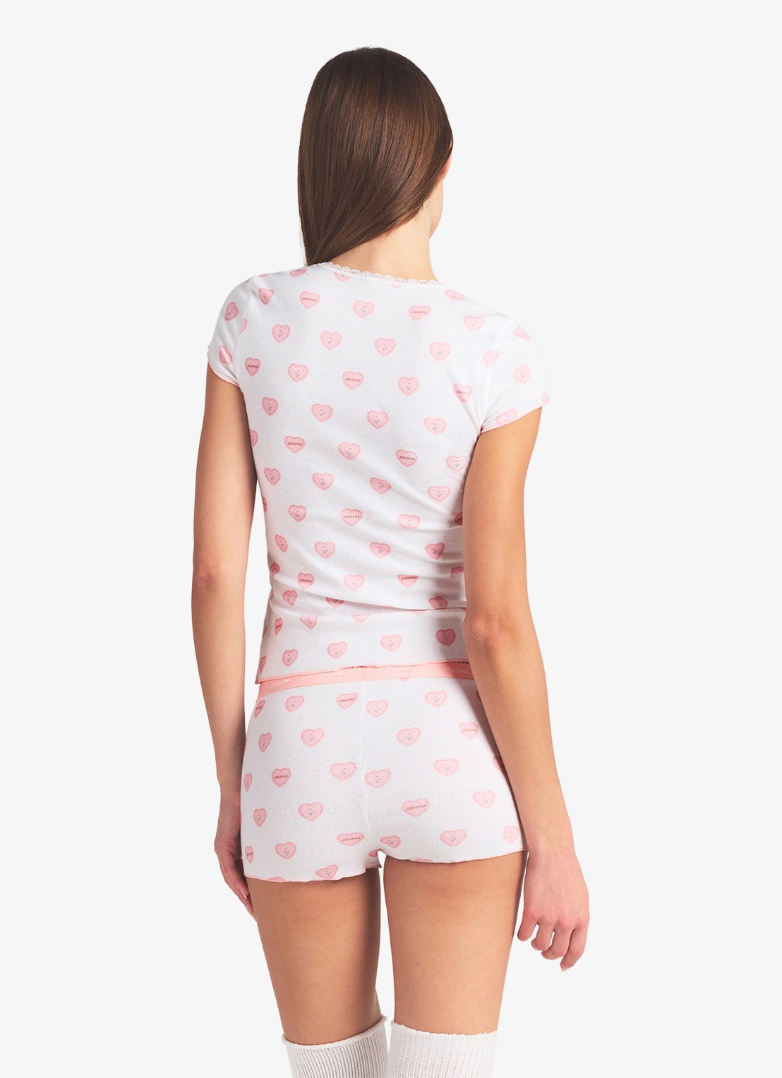 SKIMS Pointelle pyjamaset met print - achterkant snow lace hearts