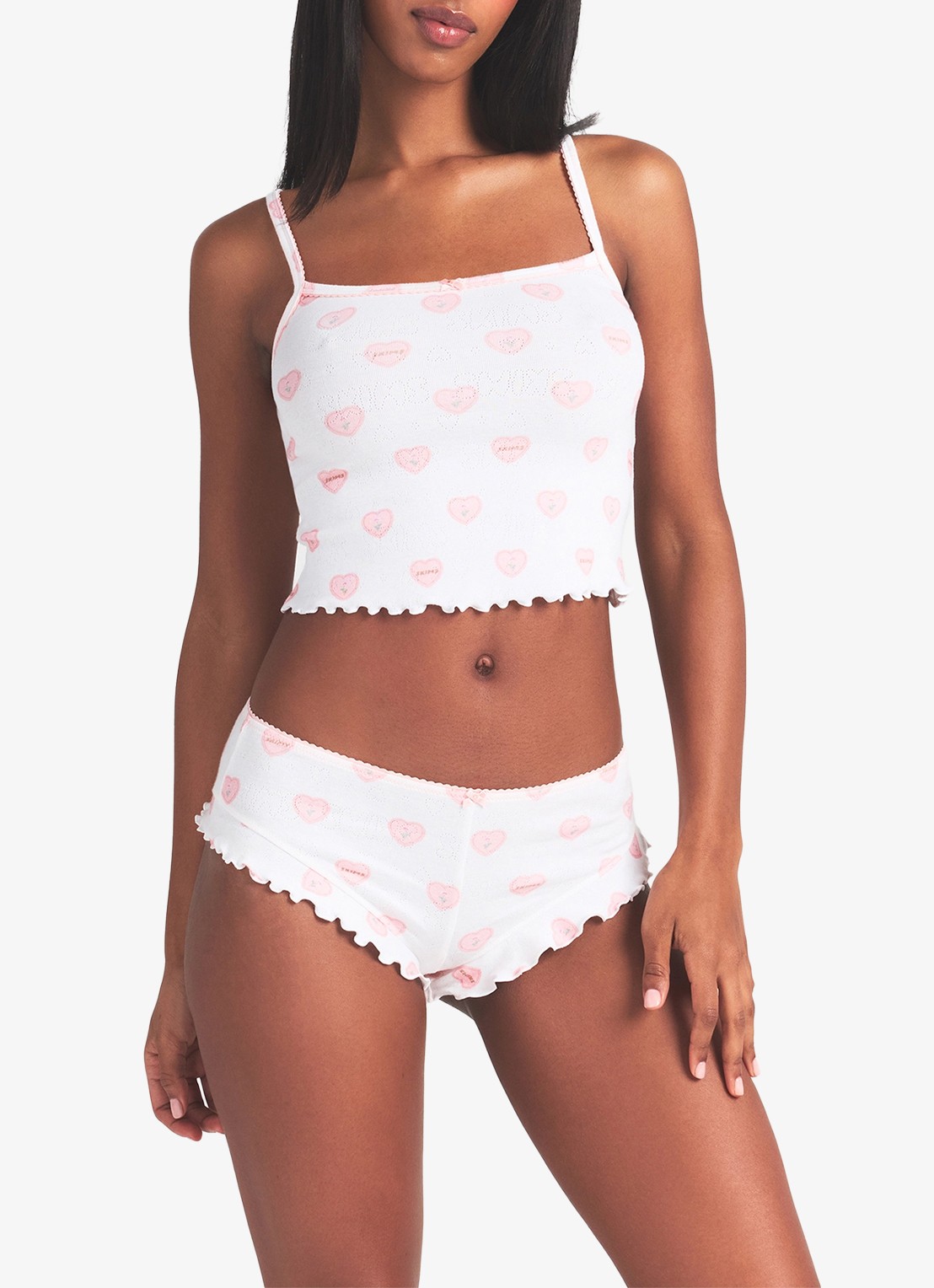 SKIMS Pointelle pyjamaset met print  - detail 4 snow lace hearts
