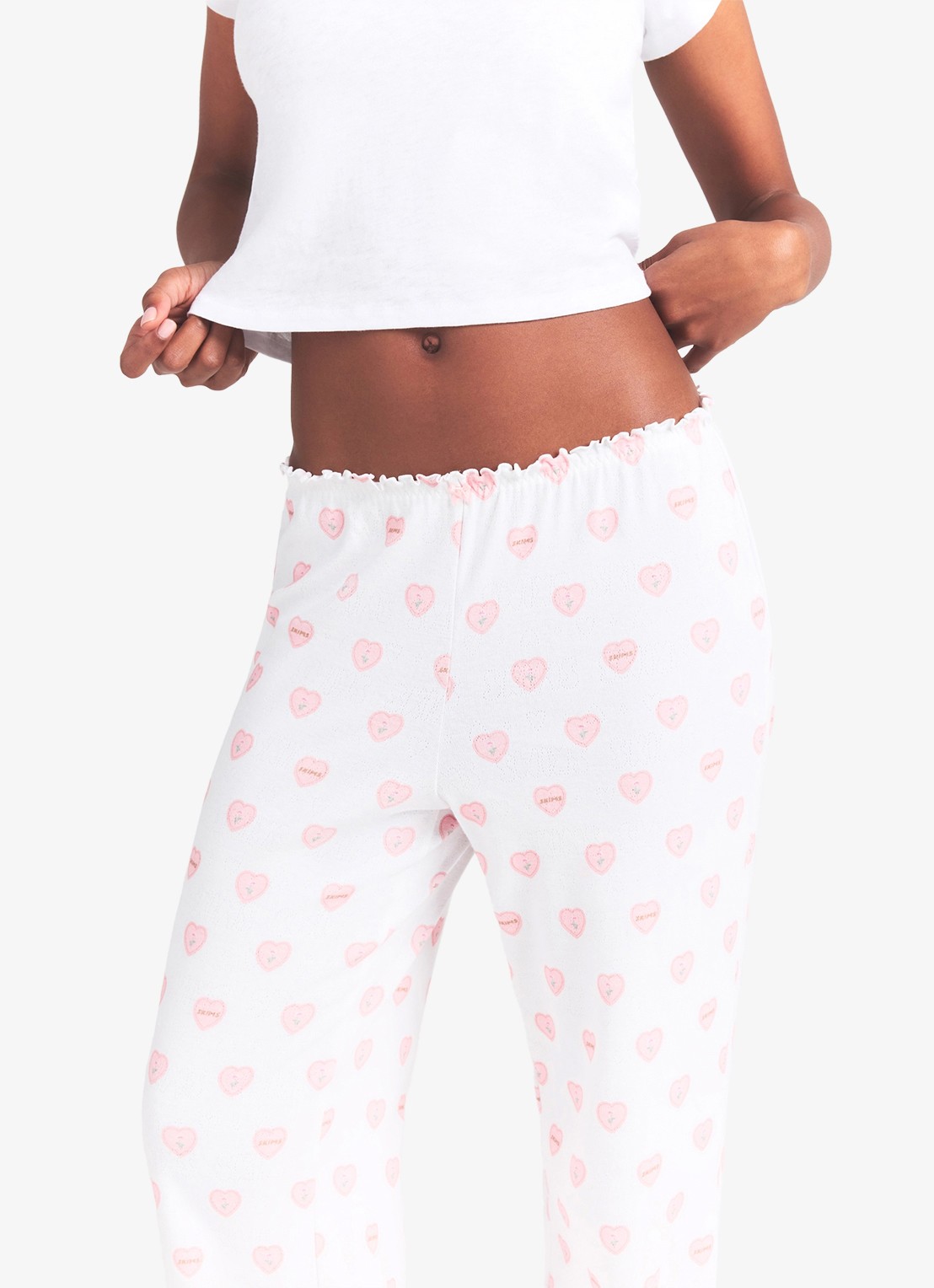SKIMS Pointelle straight fit pyjamabroek met print - detail 4 snow lace hearts