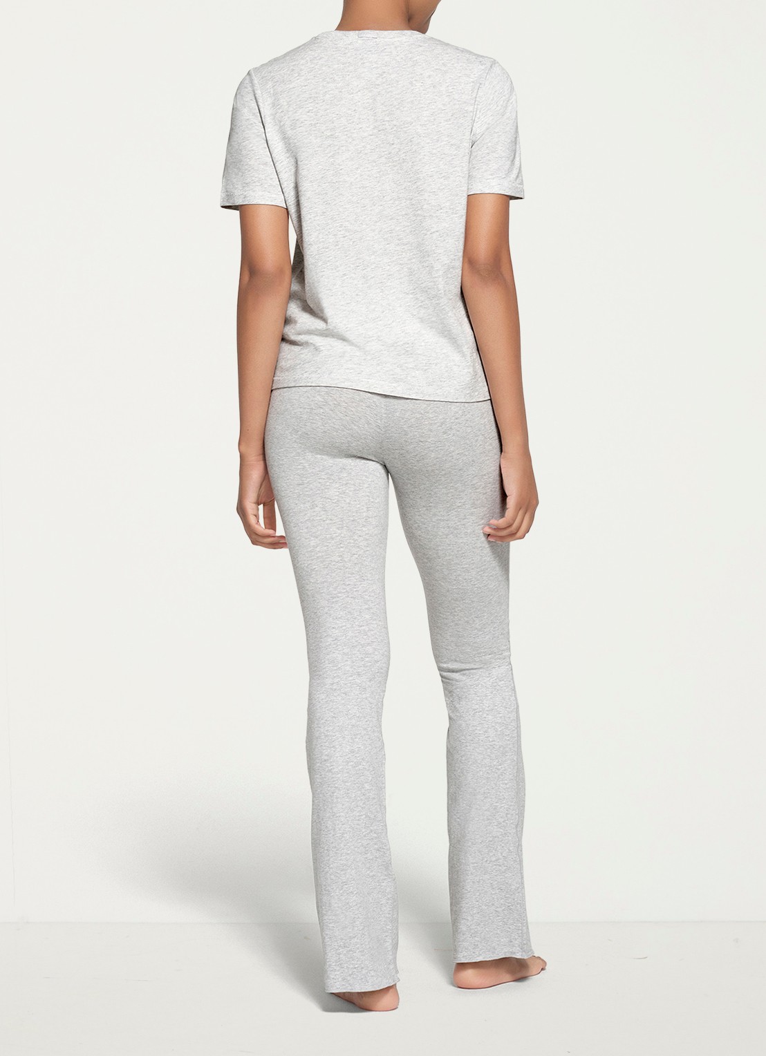 SKIMS Relaxed Tees T-shirt met ronde hals - achterkant lichtgrijs