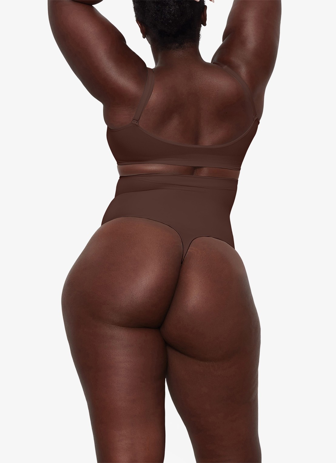SKIMS Seamless Sculpt high waisted corrigerende string - achterkant 3 donkerbruin