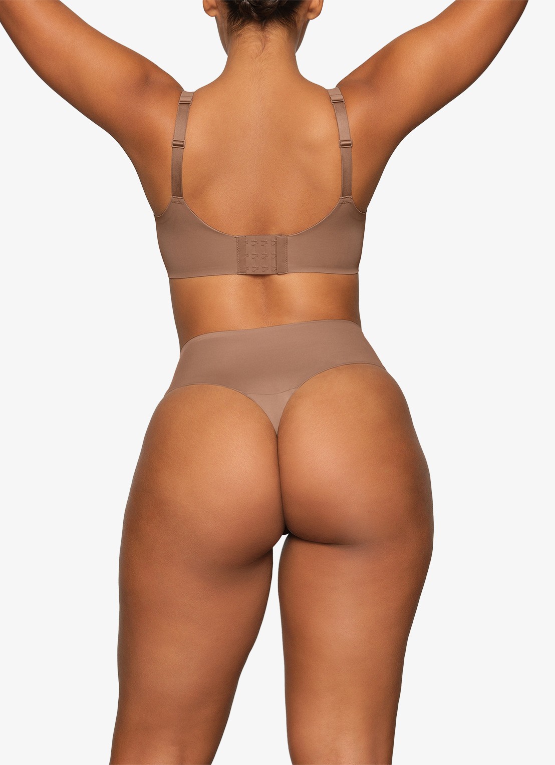 SKIMS Smoothing intimates high waisted tanga - achterkant beige