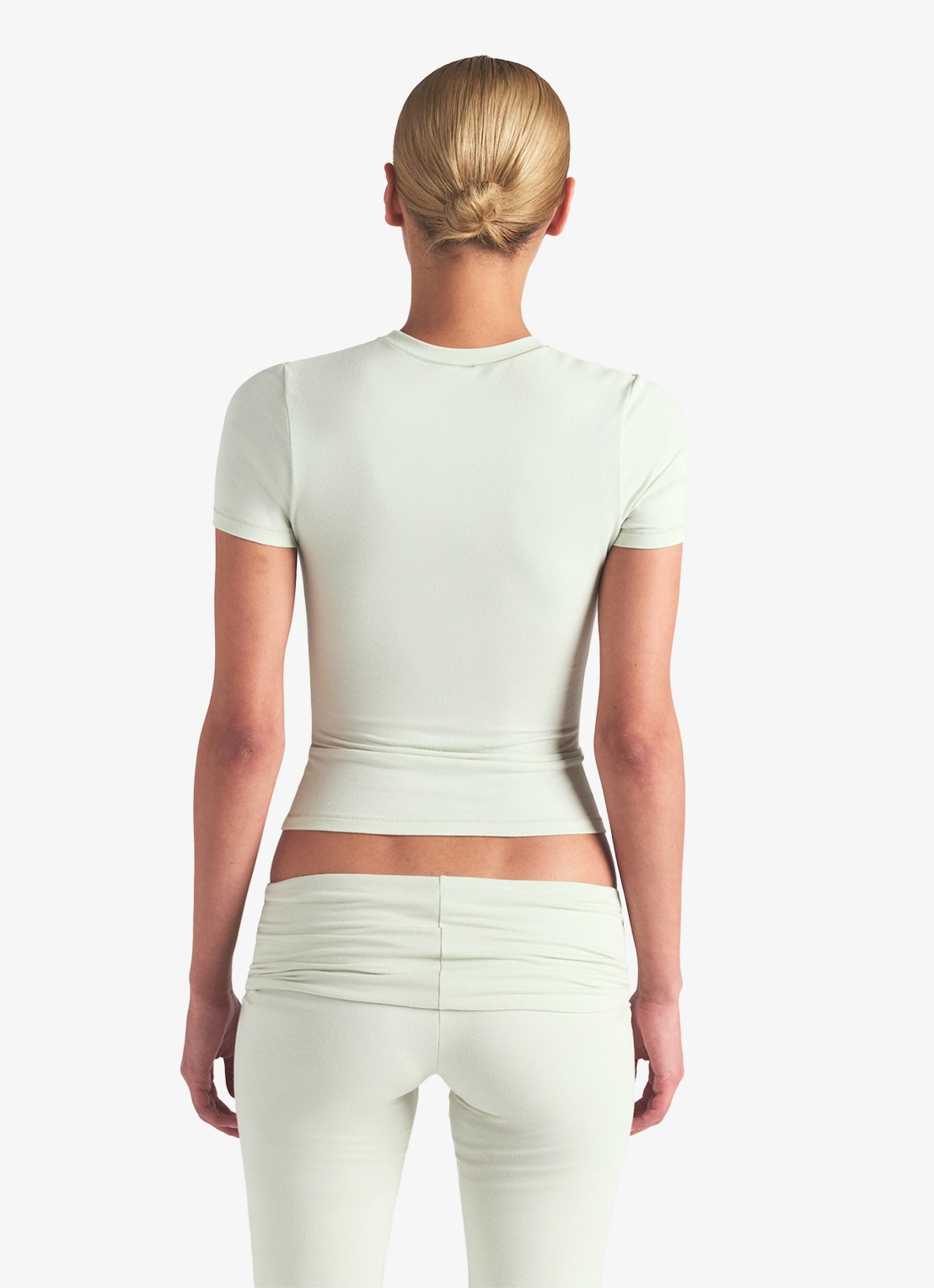 SKIMS T-shirt van jersey met ribstructuur - achterkant mint