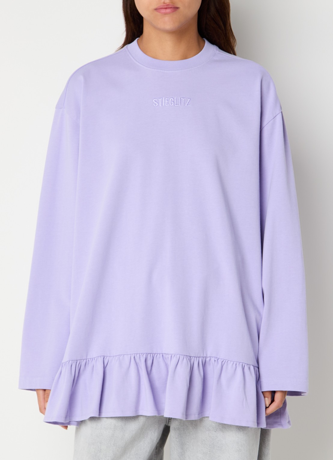 Stieglitz Brisa longsleeve met logo en volant - detail paars