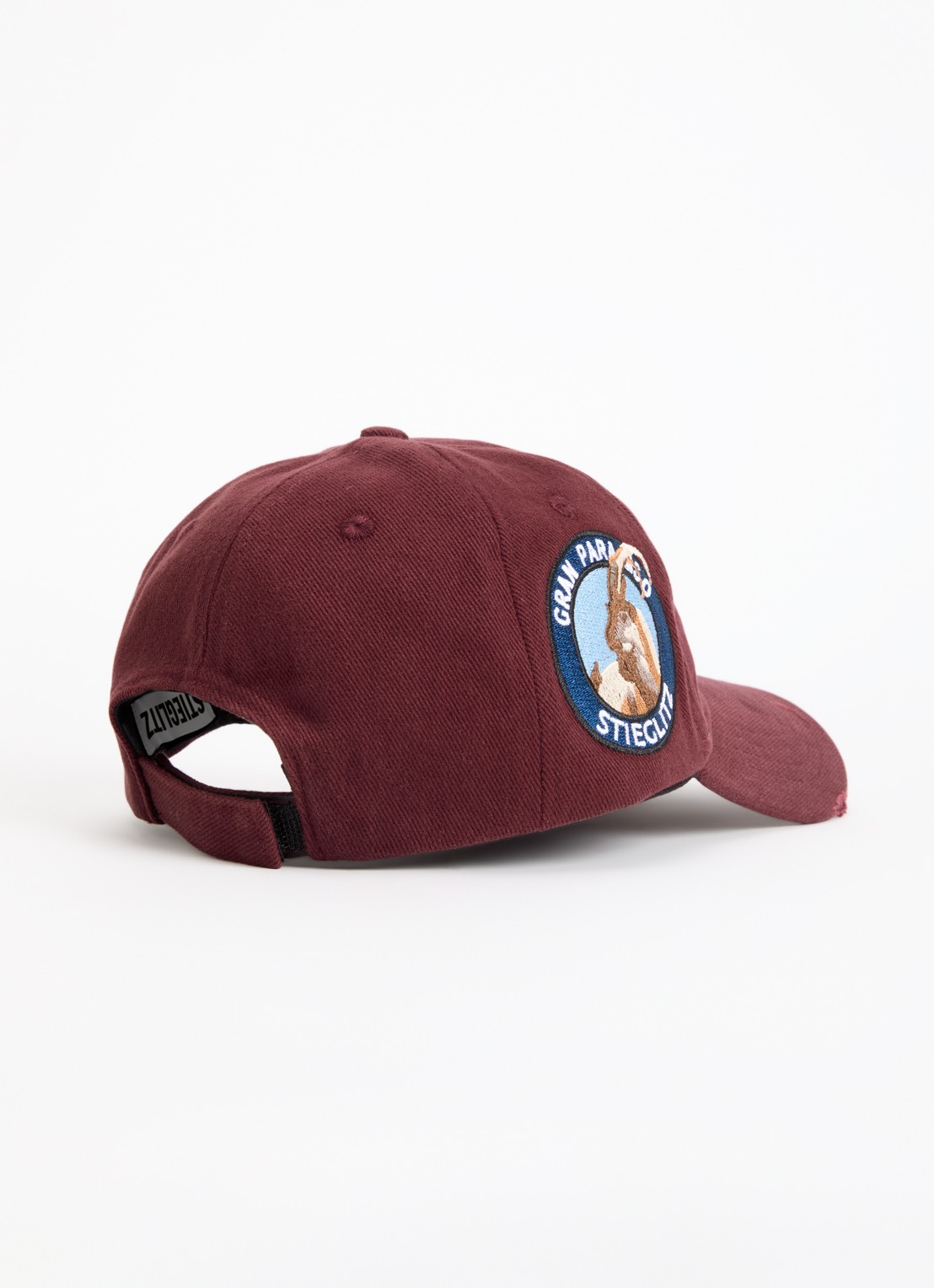 Stieglitz Duarte pet met logoborduring - detail bordeauxrood
