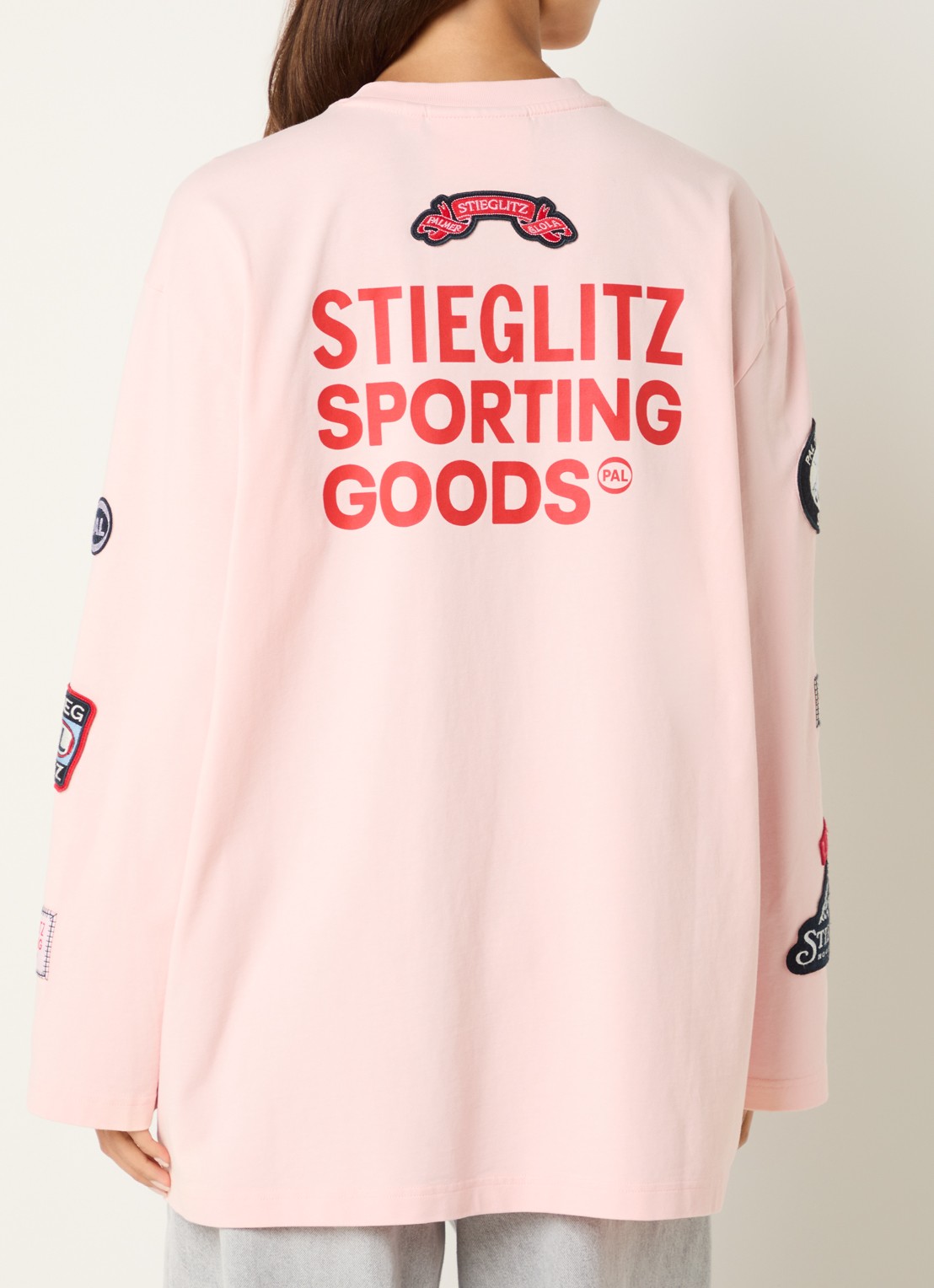 Stieglitz Juliana oversized longsleeve met logo- en backprint - detail zalmroze