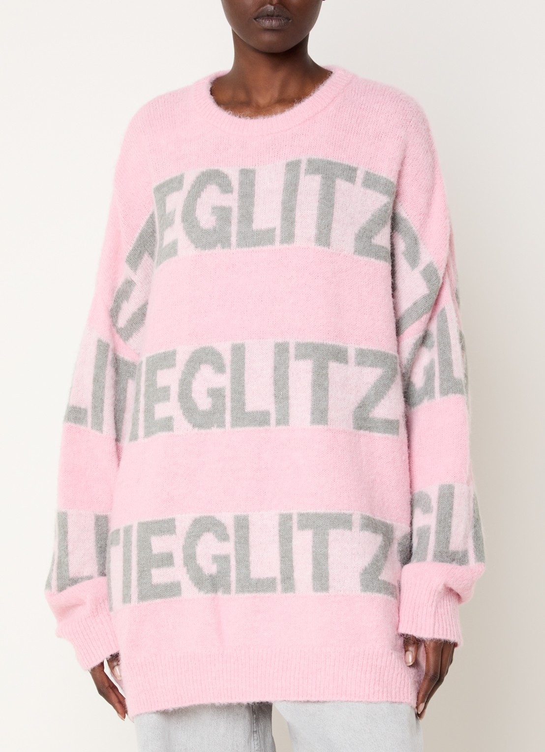 Stieglitz Keisa grofgebreide trui met logoprint - detail 2 roze