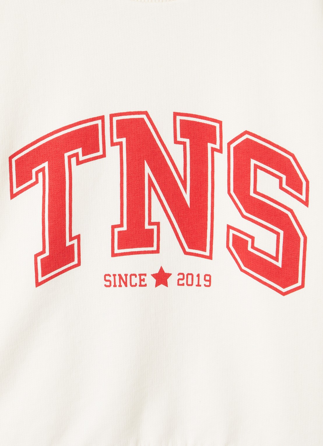 The New Society Tansy sweater met logoprint - detail creme