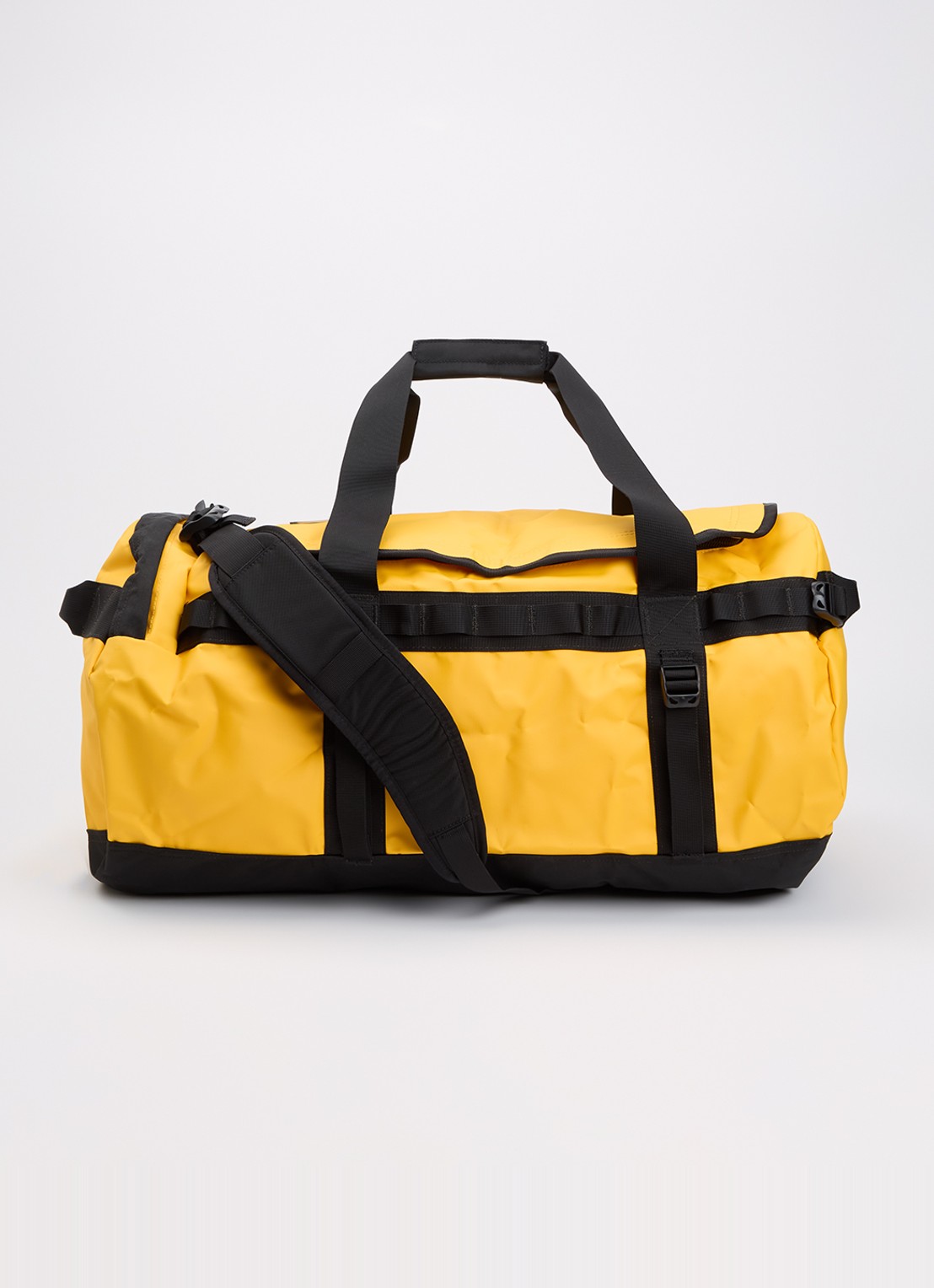 The North Face Base Camp Duffel M weekendtas met verstelbare schouderriem - voorkant 4 geel