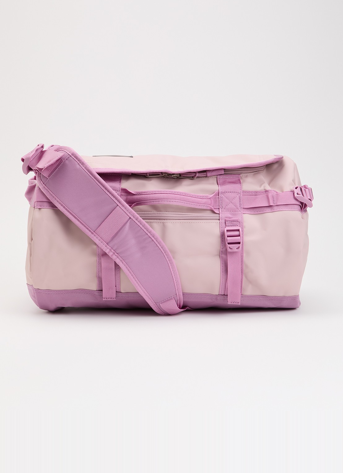 The North Face Base Camp Duffel XS weekendtas met verstelbare schouderriem - voorkant oudroze