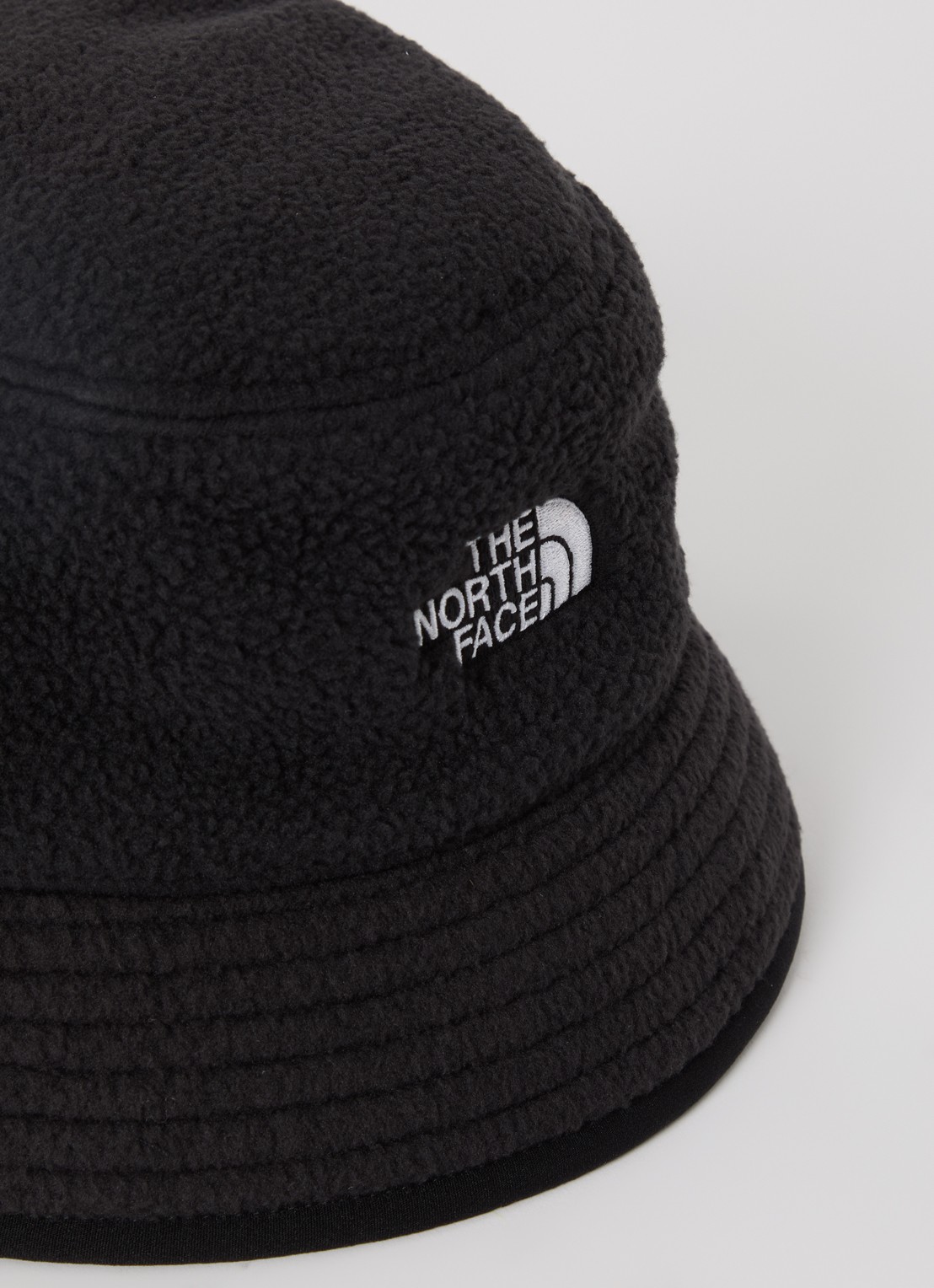 The North Face Bucket hoed van fleece met logo - detail zwart