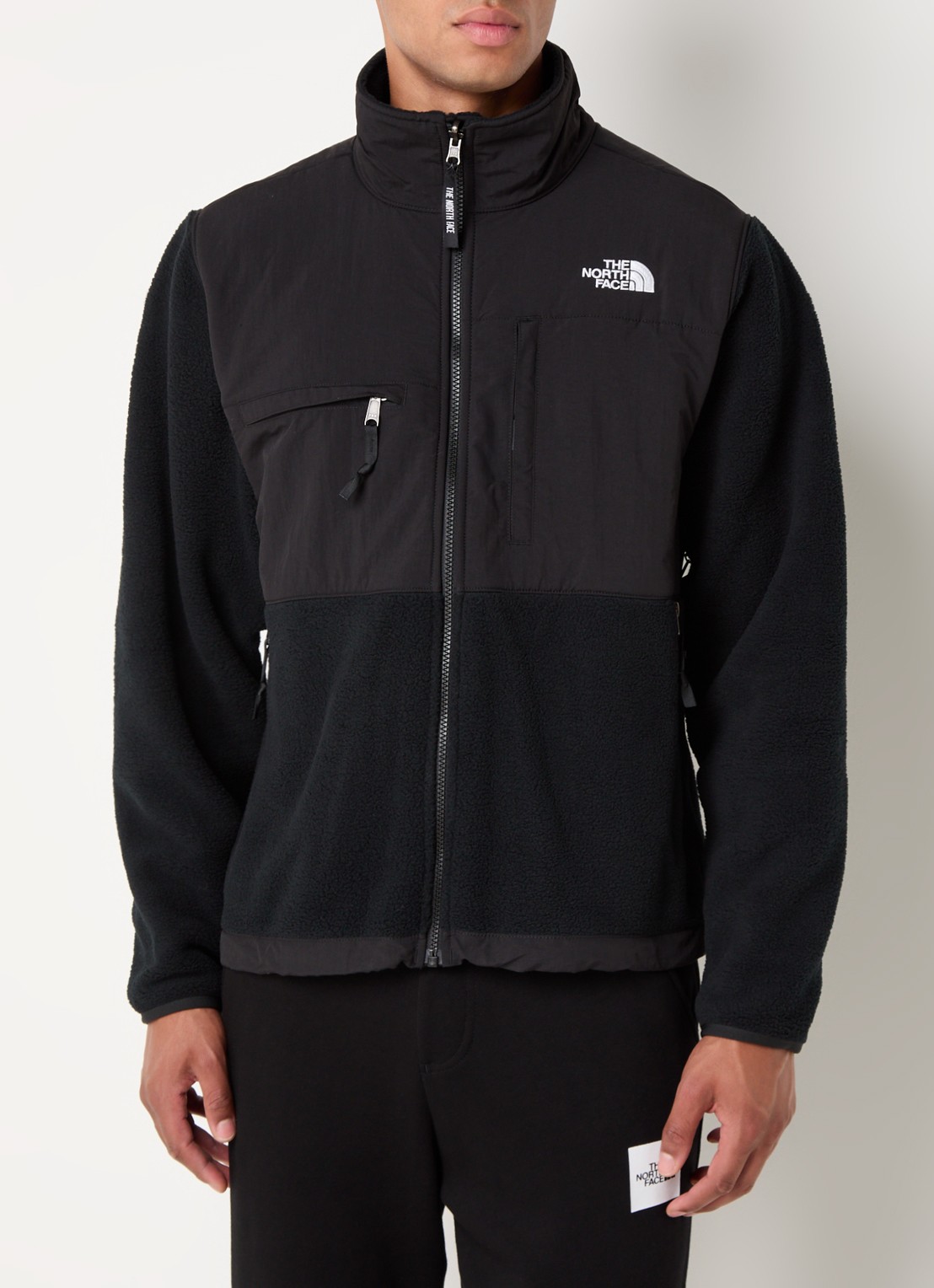 The North Face Jack van teddy met ritszakken en logo - detail zwart
